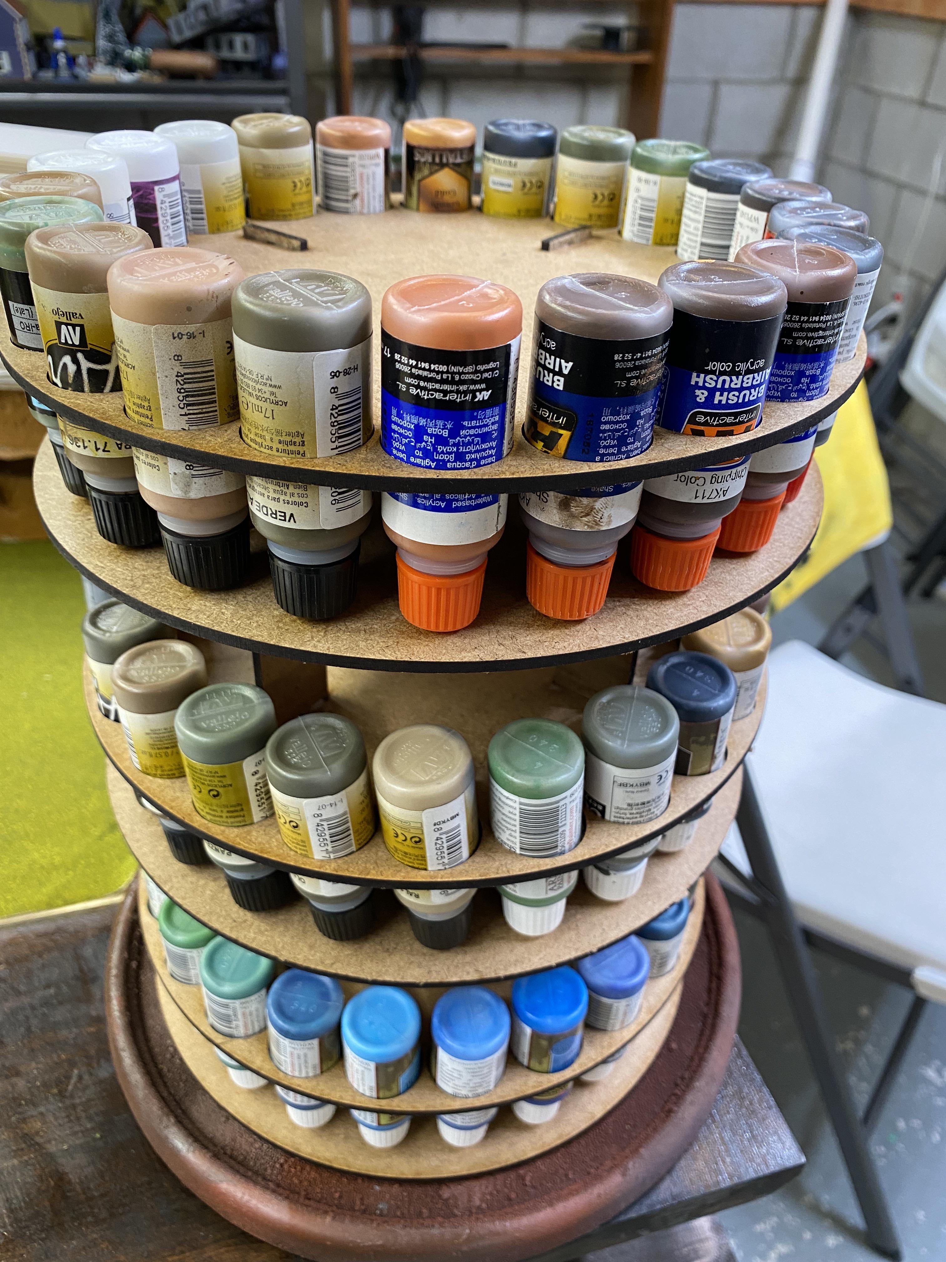 Spent the whole day making this laser cut paint holder. Holds 66