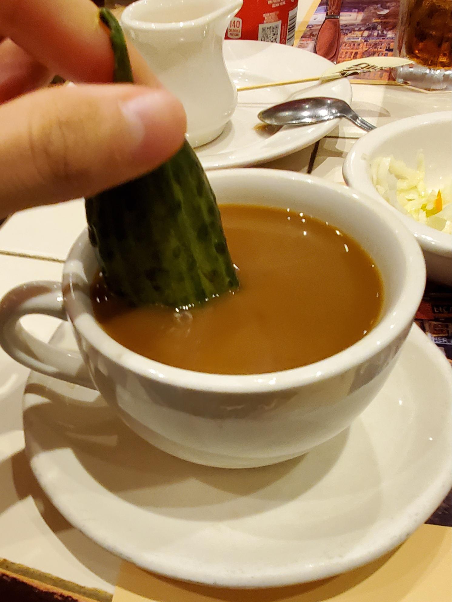 Pickle dipped in coffee r/shittyfoodporn