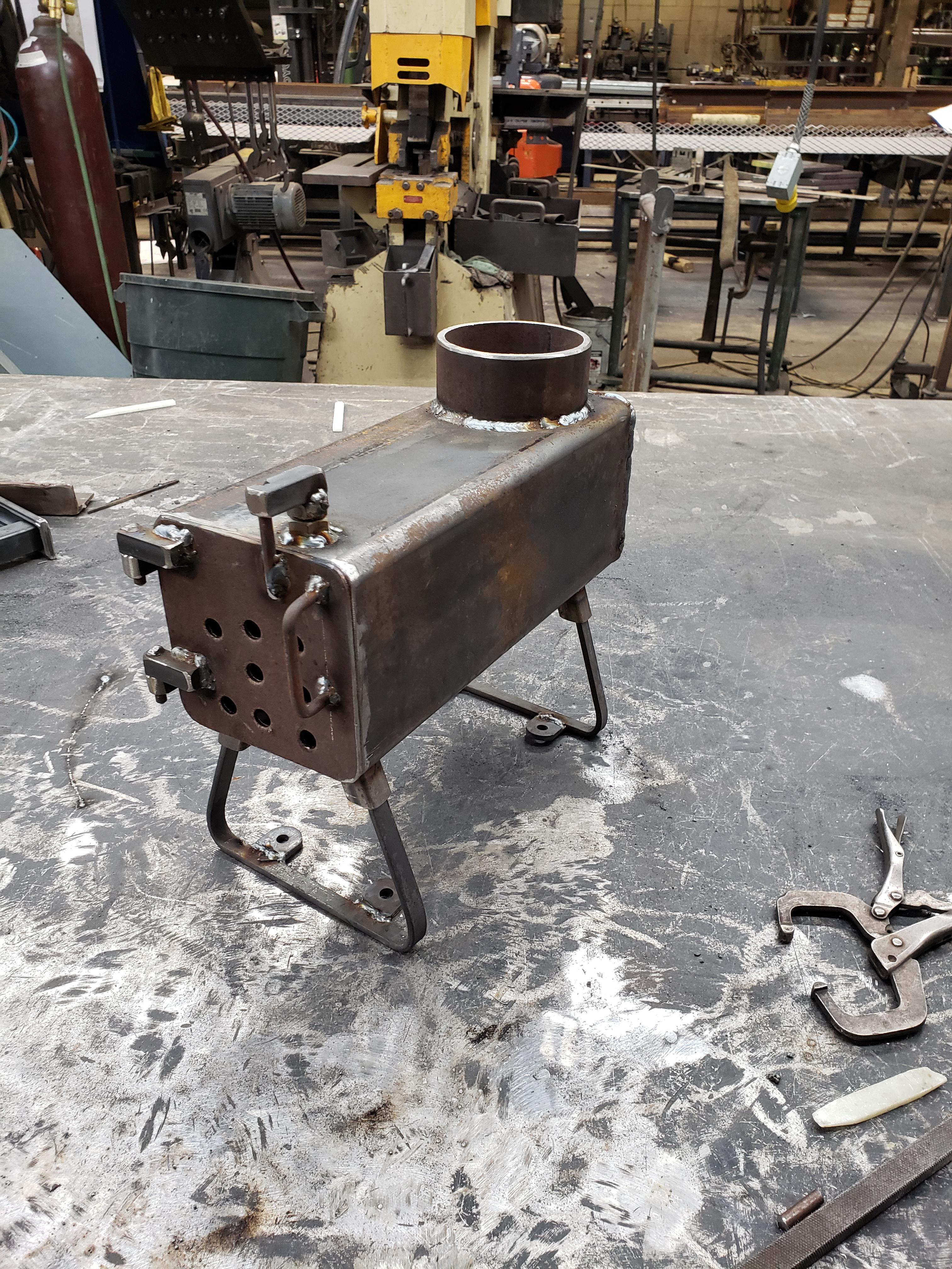 I made a mini wood stove for ice fishing r/metalworking