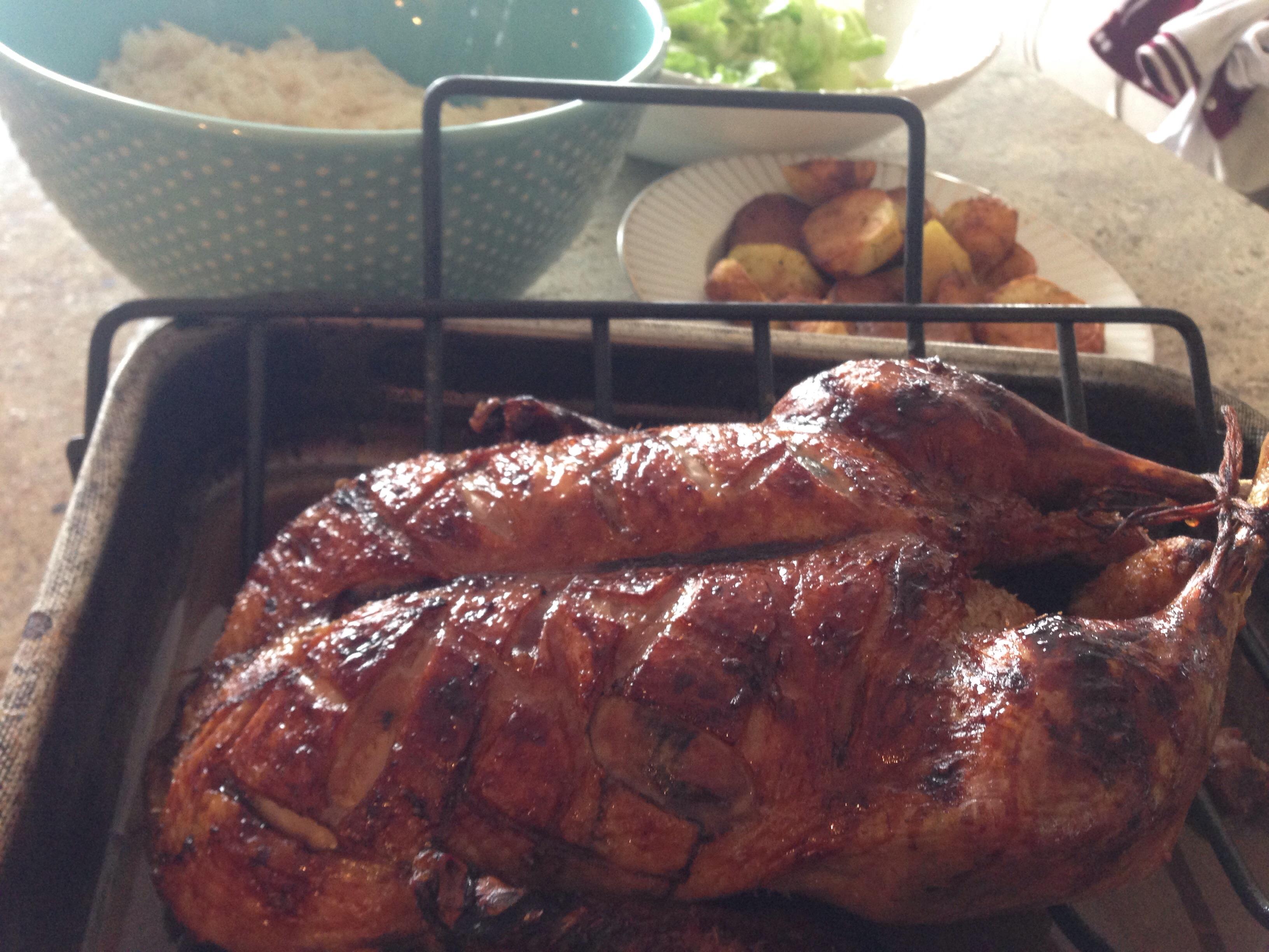 Roasted duck with honey , lemon and balsamic making crispy skin and