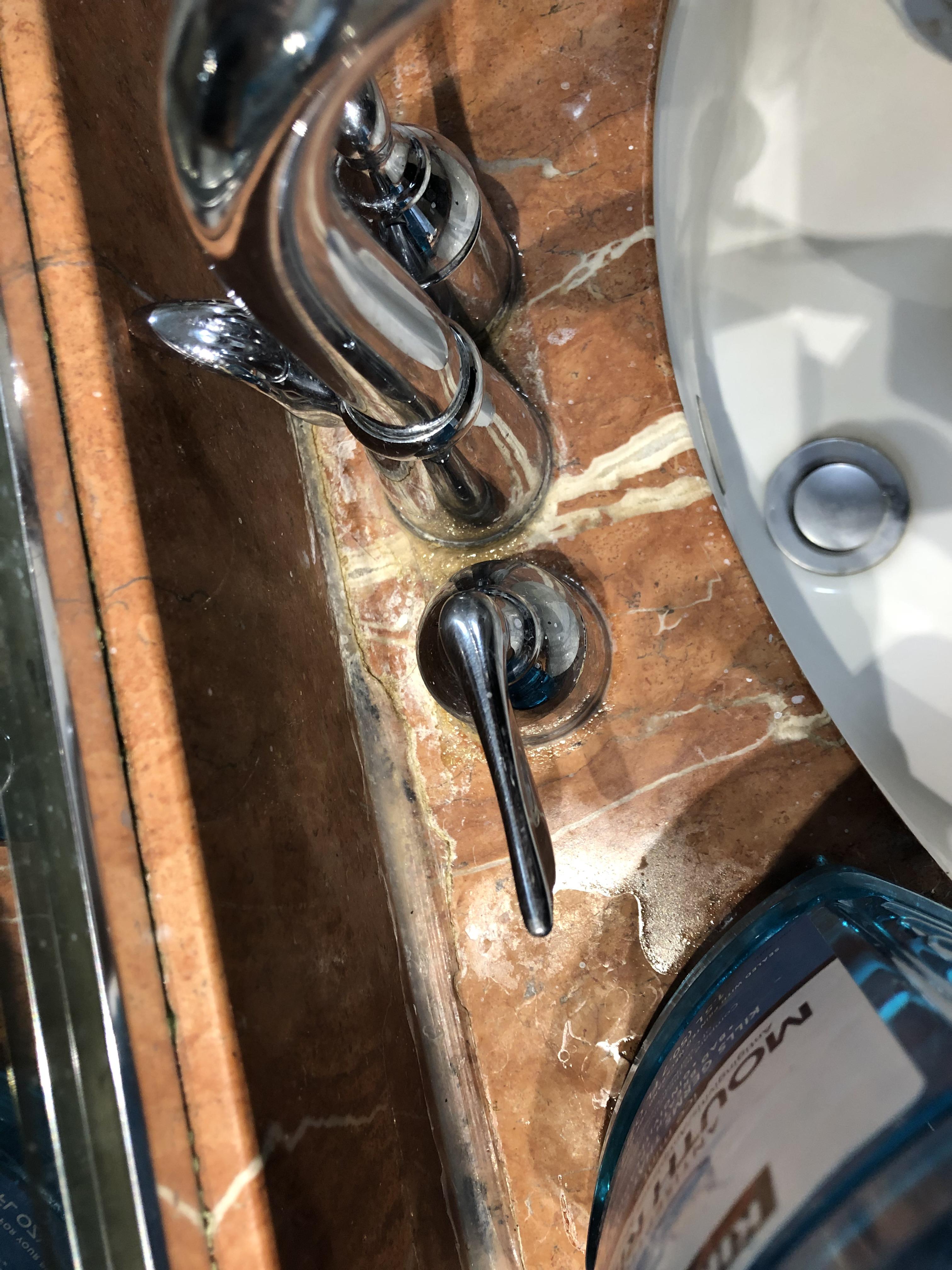 I have some “crud” build up around the faucet on the granite bathroom