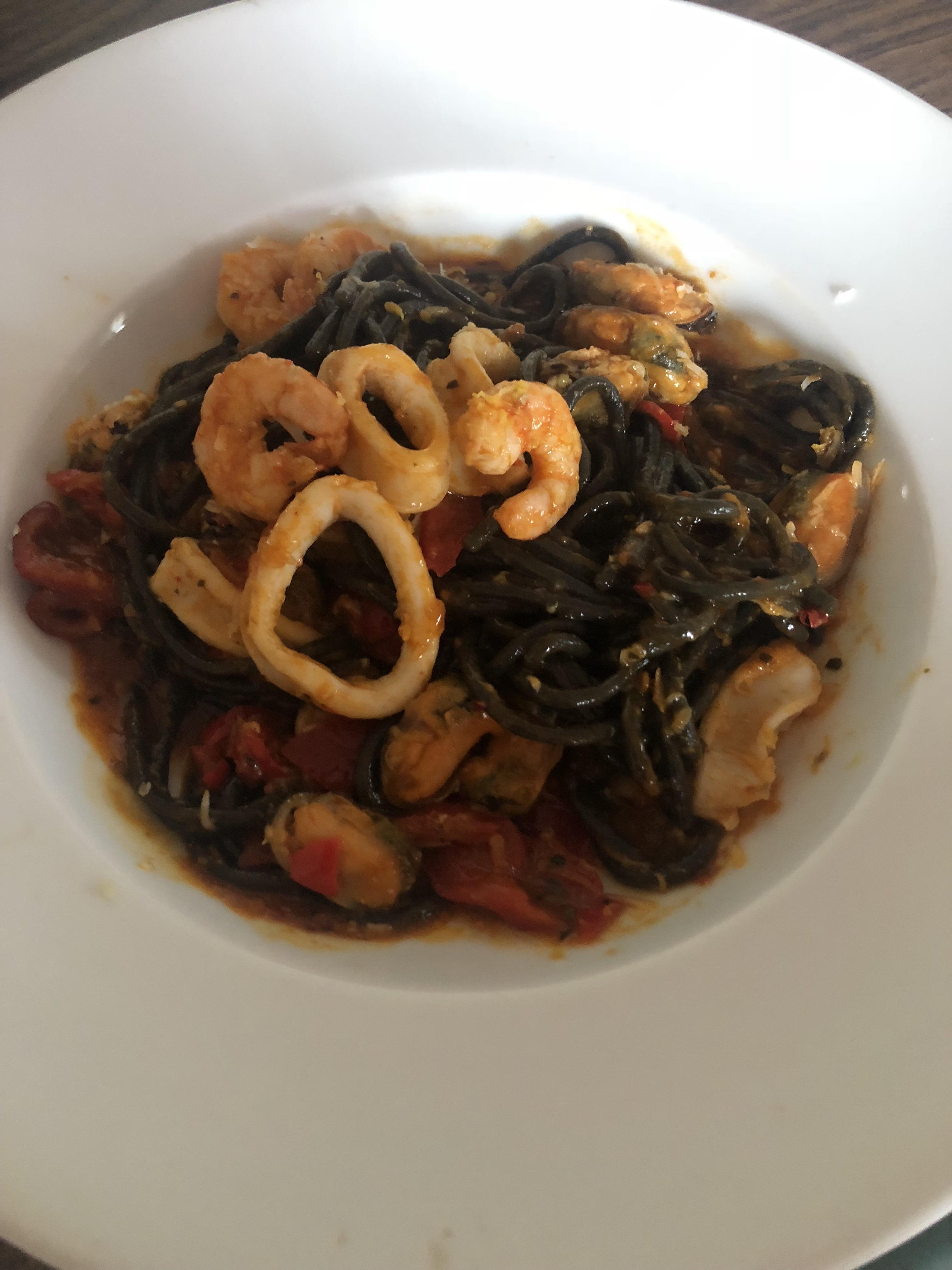 [homemade] cuttlefish ink pasta with nduja, squid, prawns, mussels and
