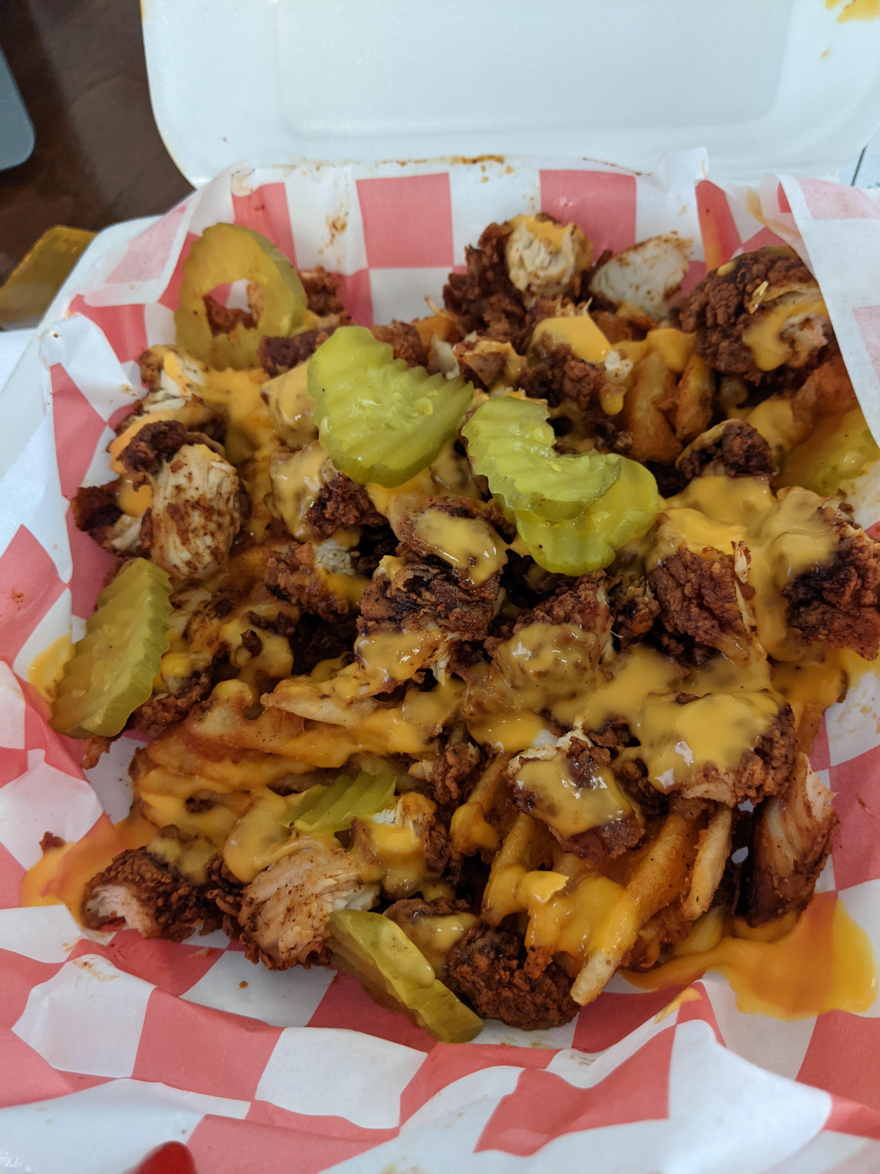 Nashville hot chicken and cheese waffle fries with pickles, heaven IS a