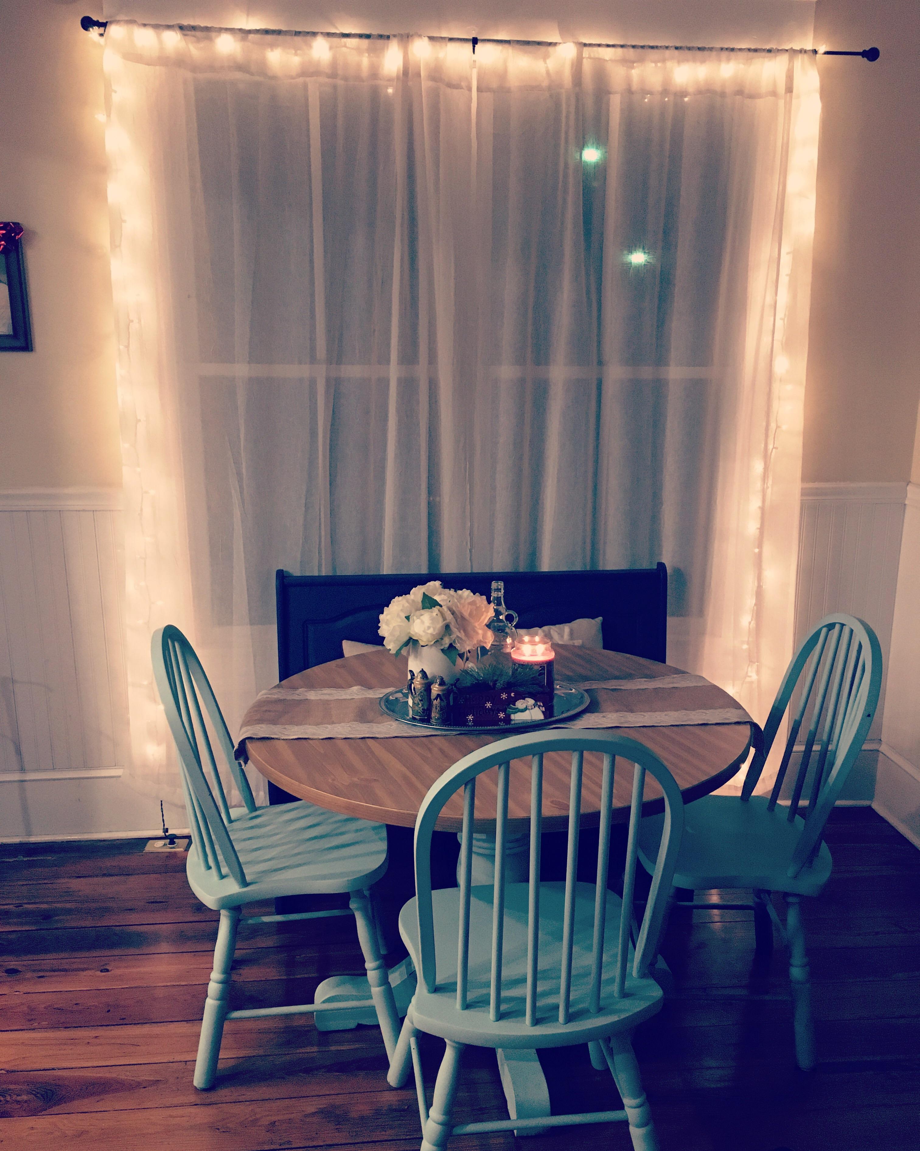 I had extra Christmas lights so I tried to make my dining area more cozy! r/CozyPlaces