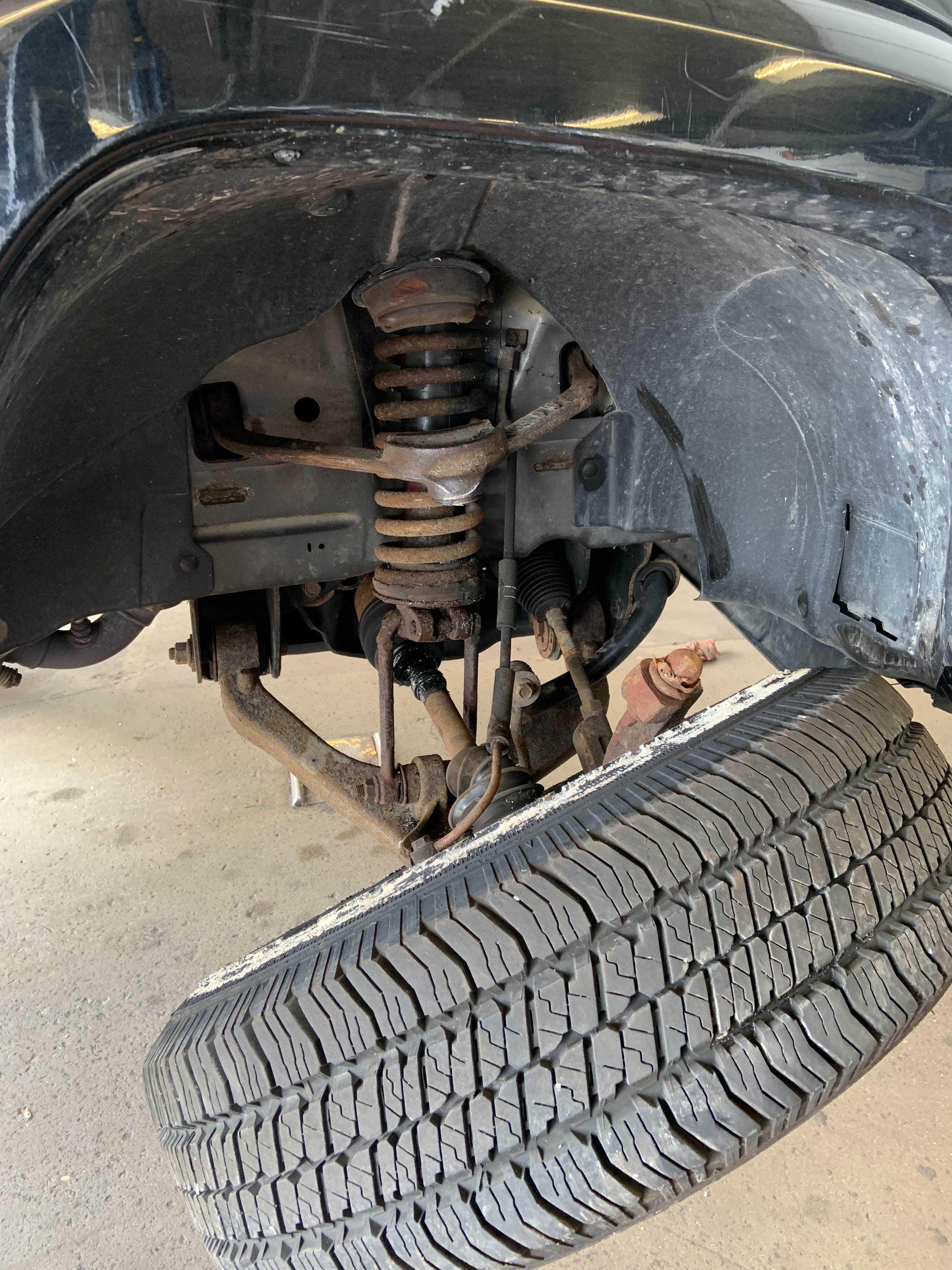 Customer states wheel fell off while vehicle was parked at the store