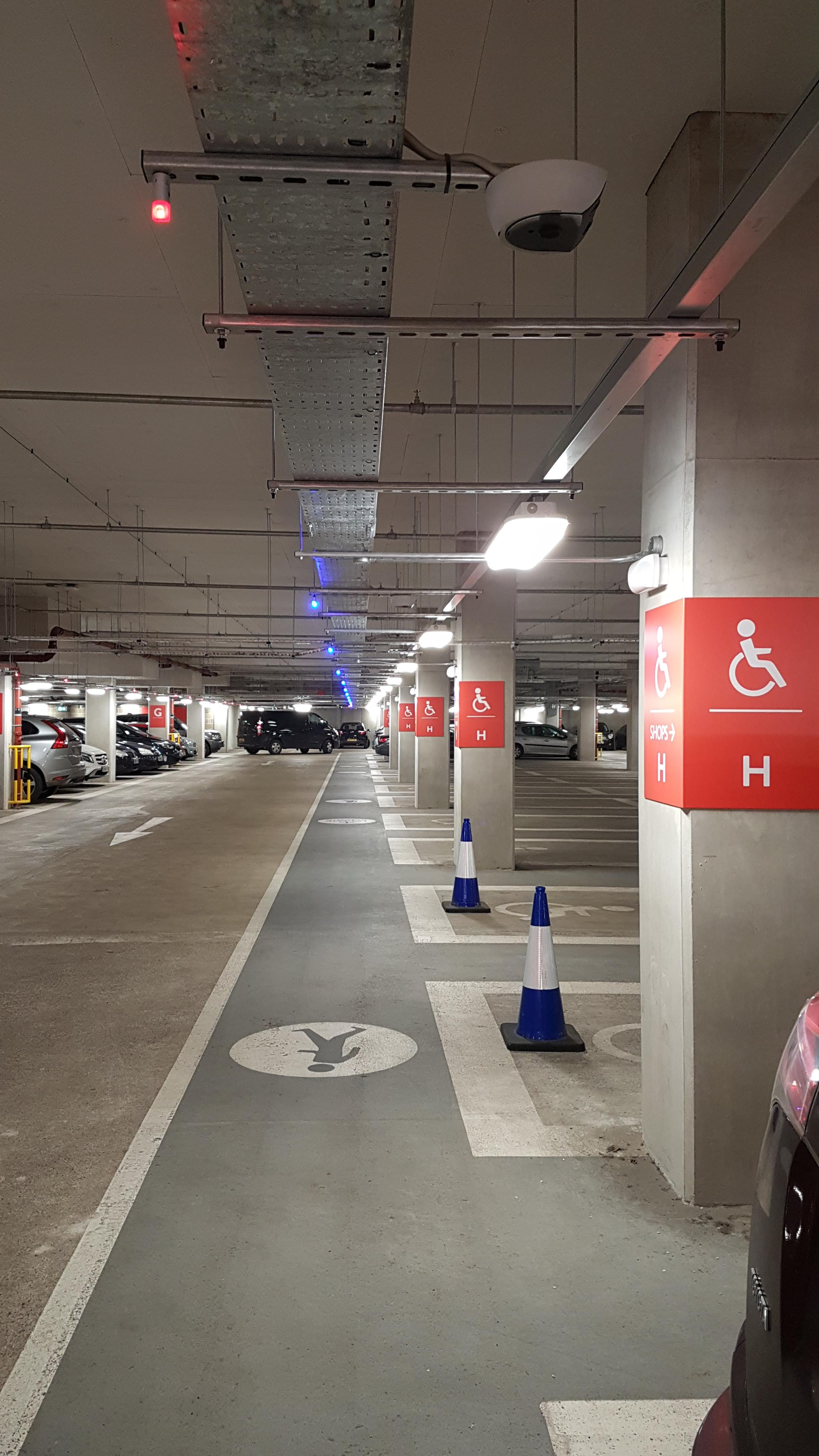 So this car park in Oxford, England has a light above each bay to show