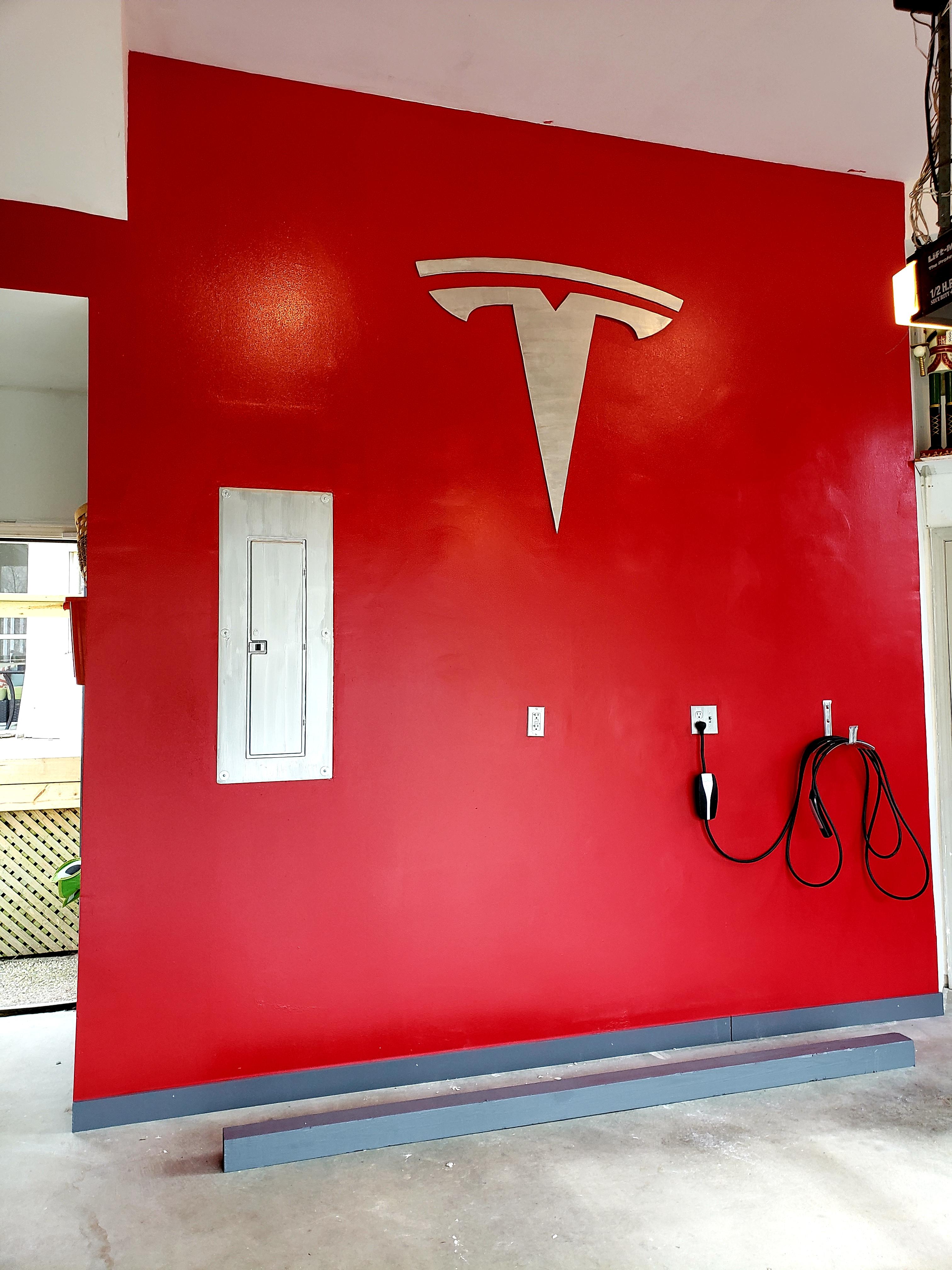 Tesla charging wall complete! r/teslamotors