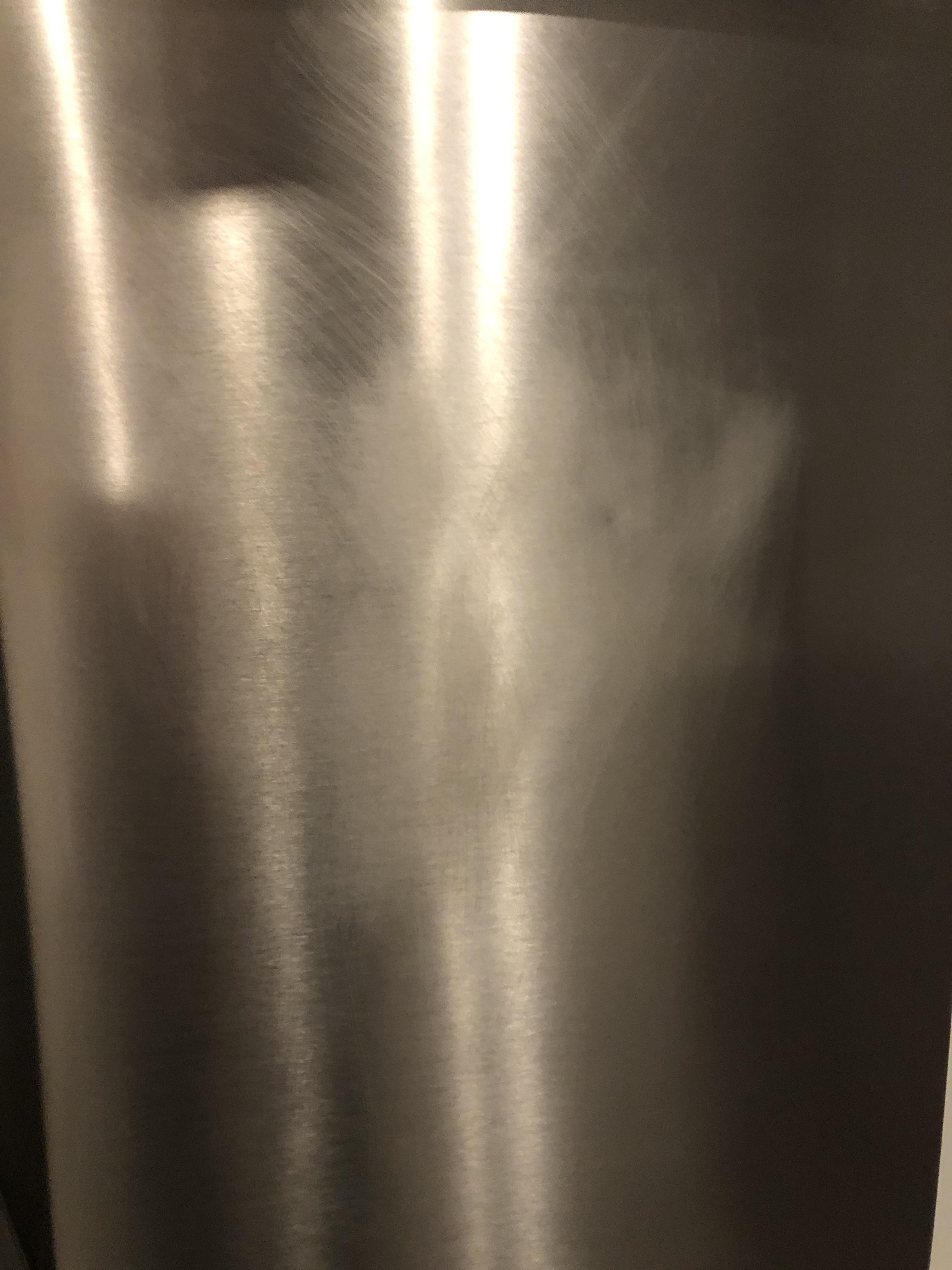 How do I fix this stainless steel fridge door? r/fixit