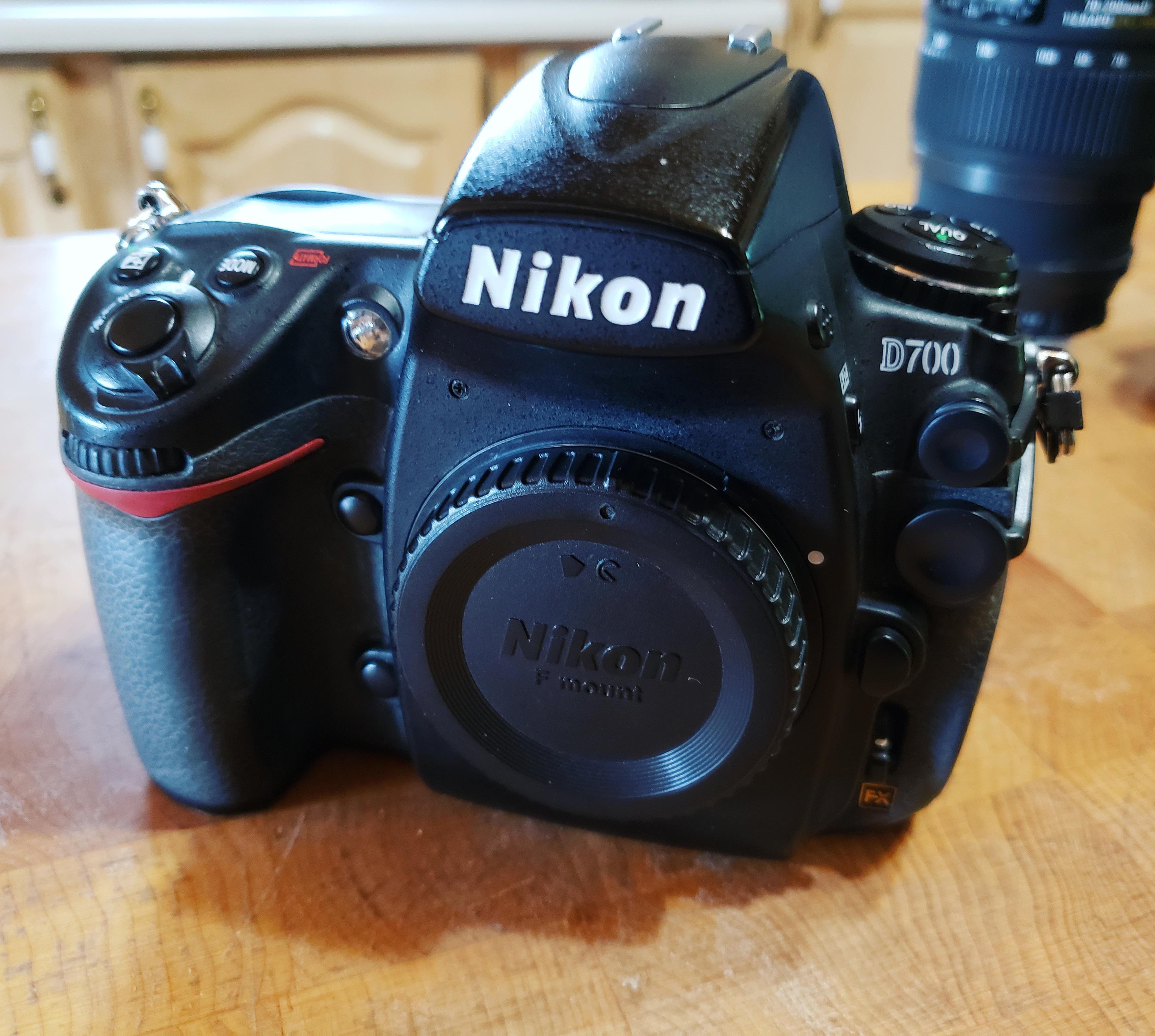 I love my new baby. Used Nikon D700, such a step up from my D5200. r