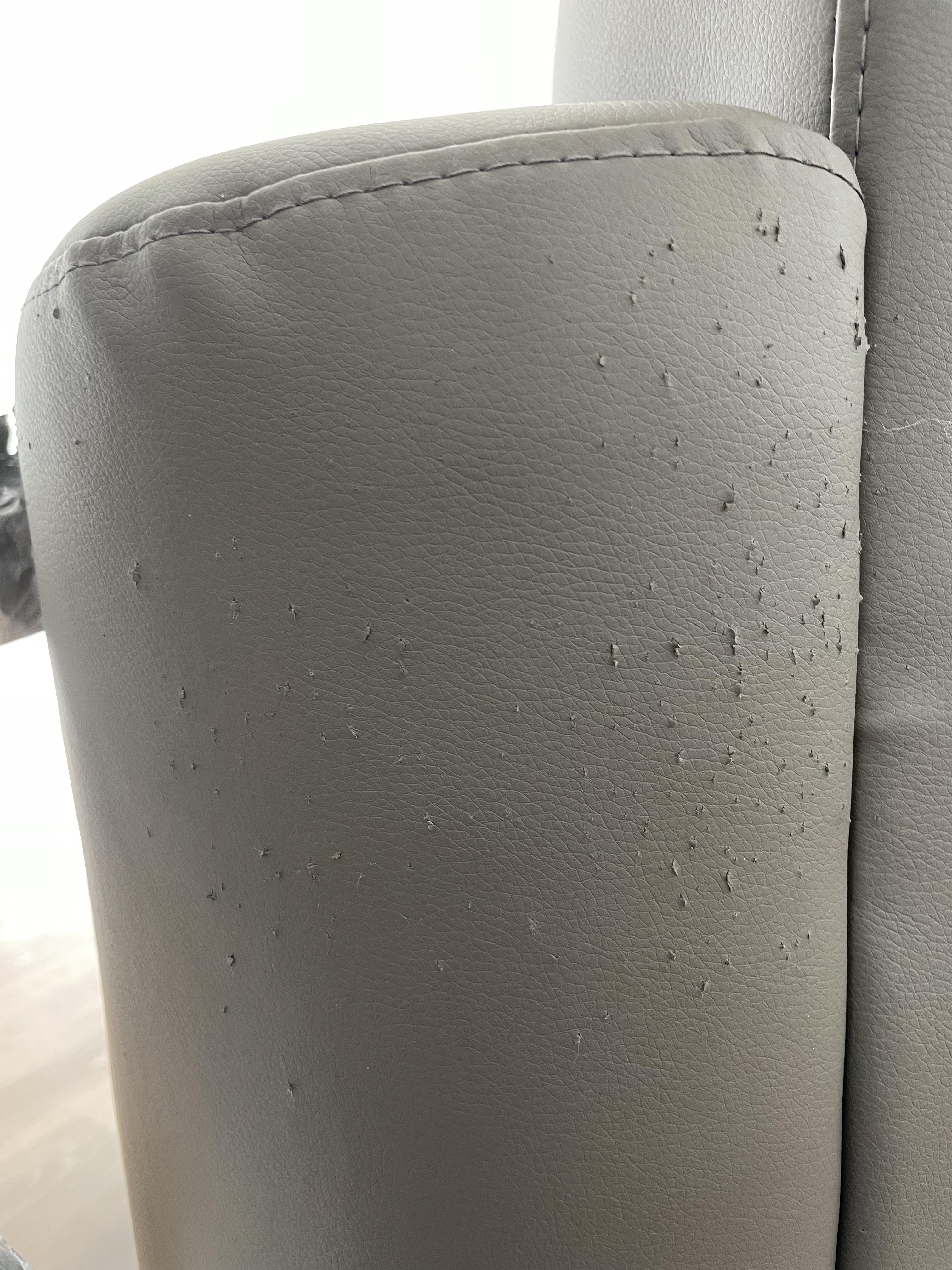 Help!!! my cat is destroying my couch how do I fix it? It belongs to my