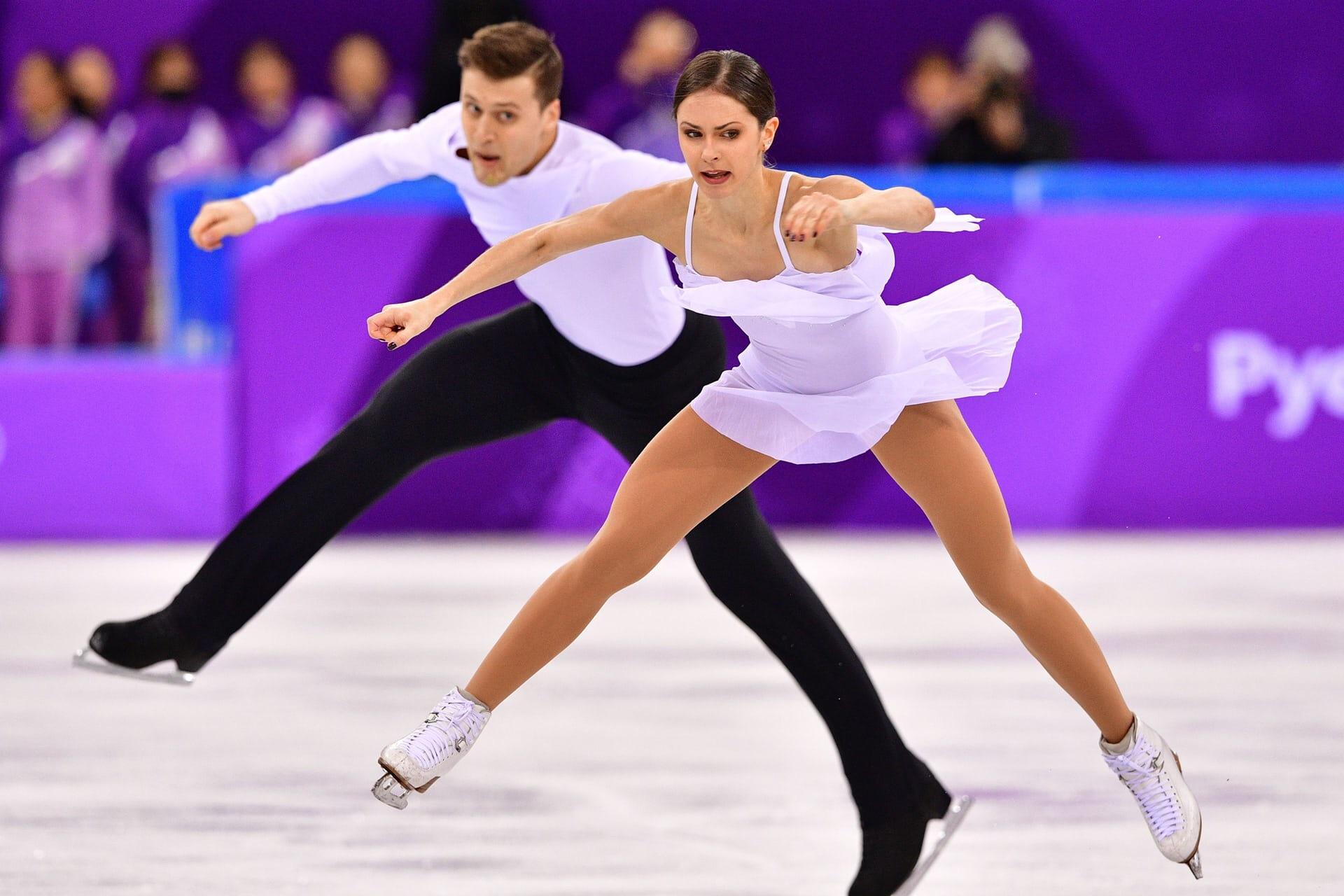 PsBattle Two figure skaters at the Winter Olympics
