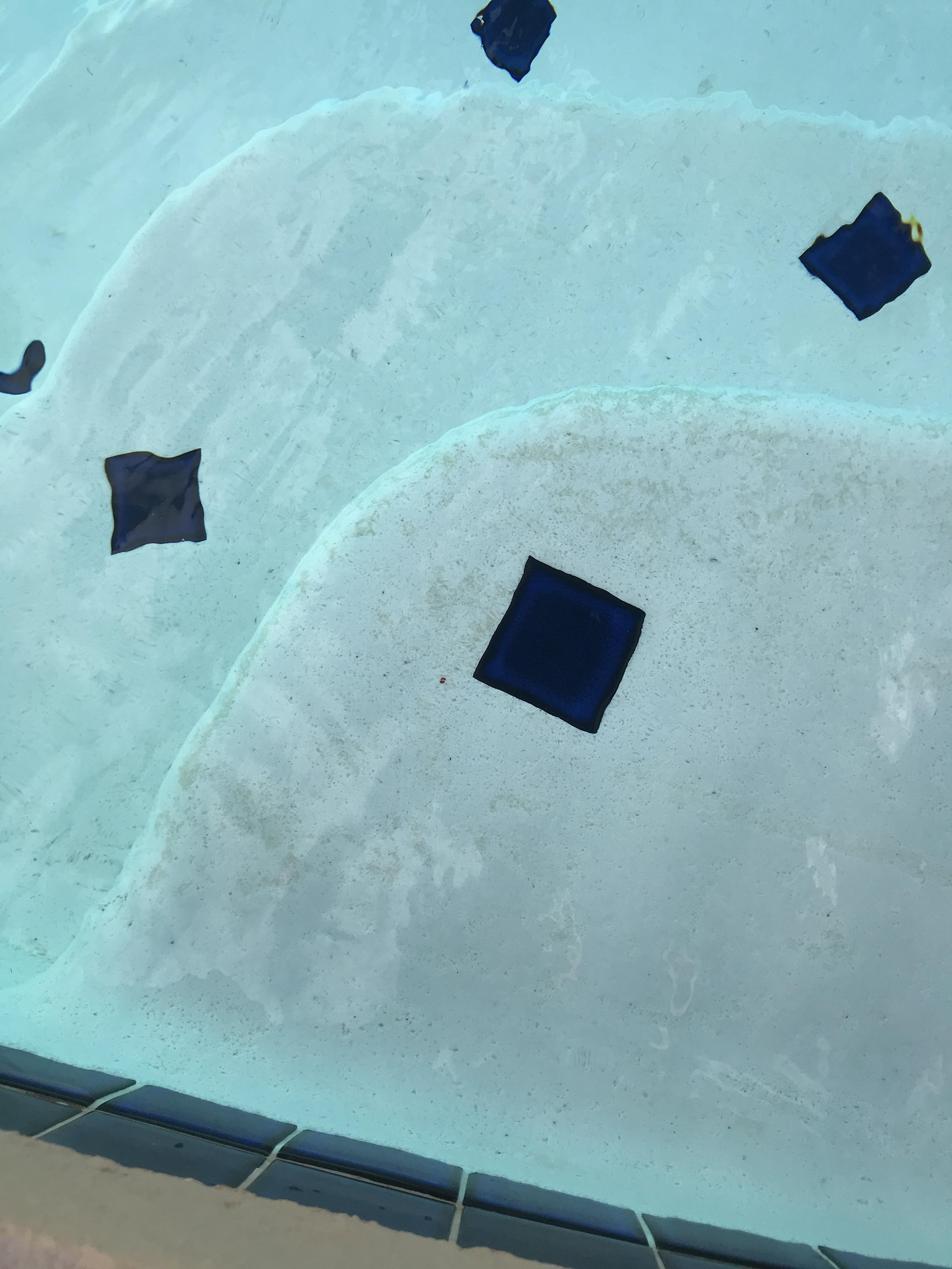 Stains on steps of pool? What is it and how to remove? r/pools
