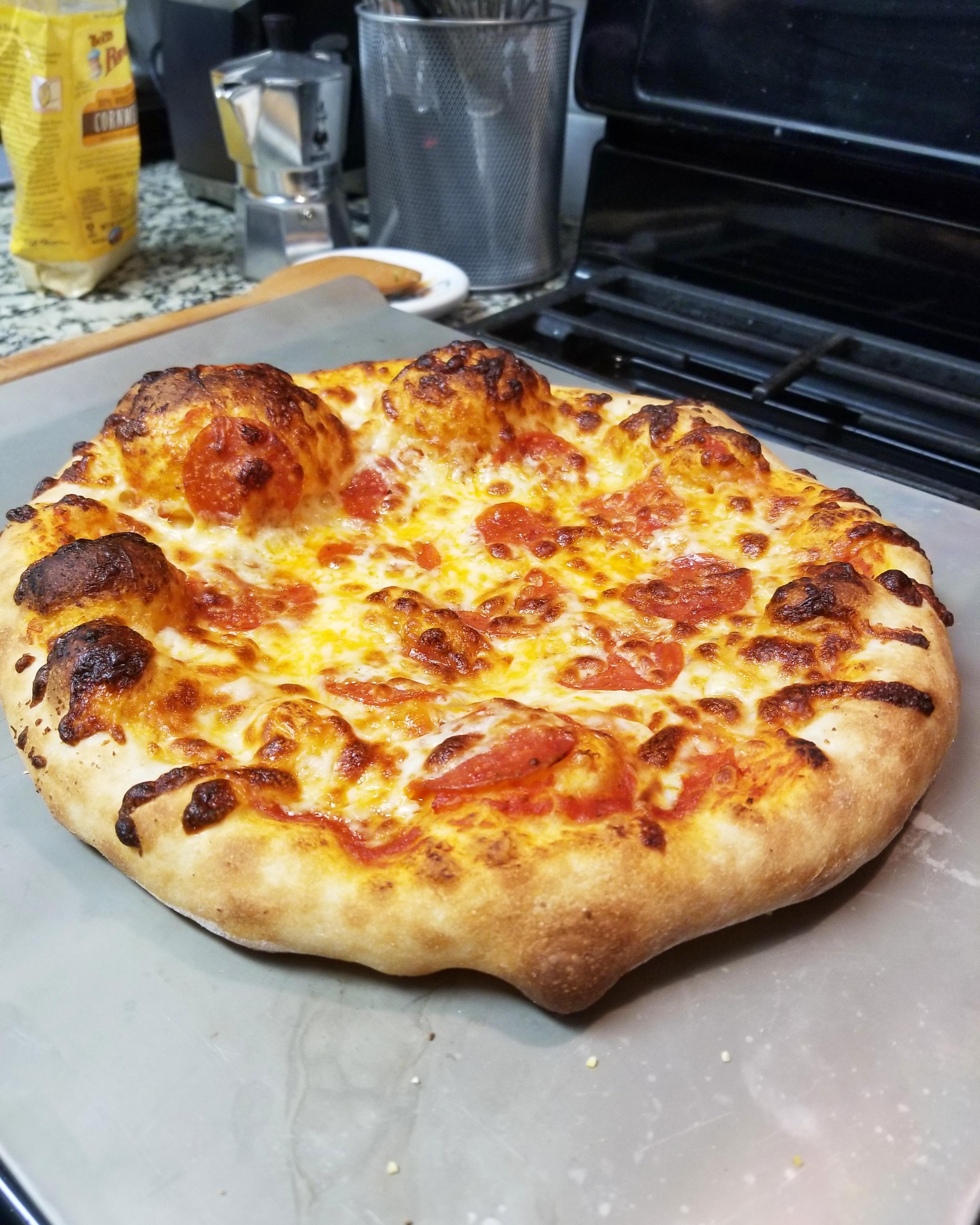 A few people suggested this belonged here. Serious Eats NY style pizza dough cooked on baking