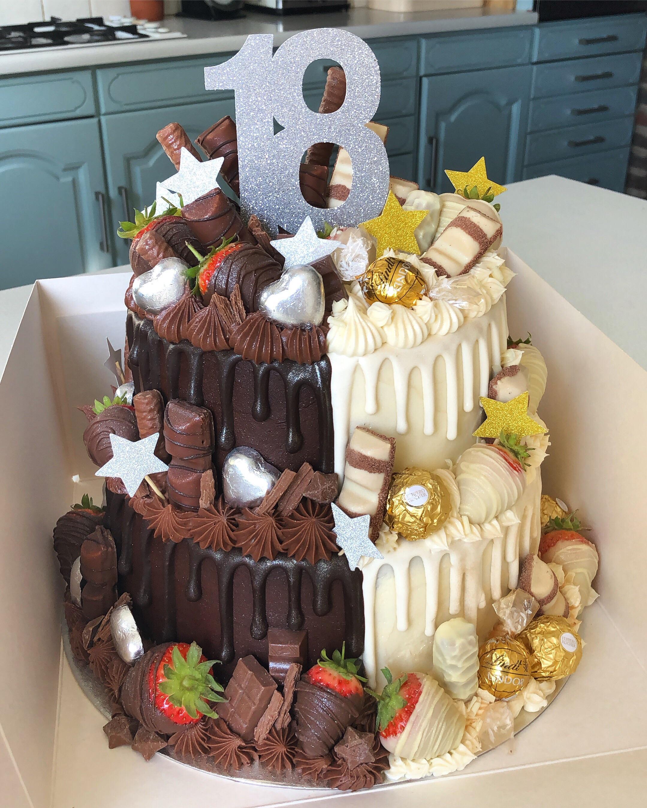 Half and half milk and white chocolate cake, bottom tier red velvet and