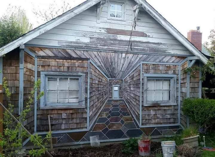 This optical illusion built into the side of a house