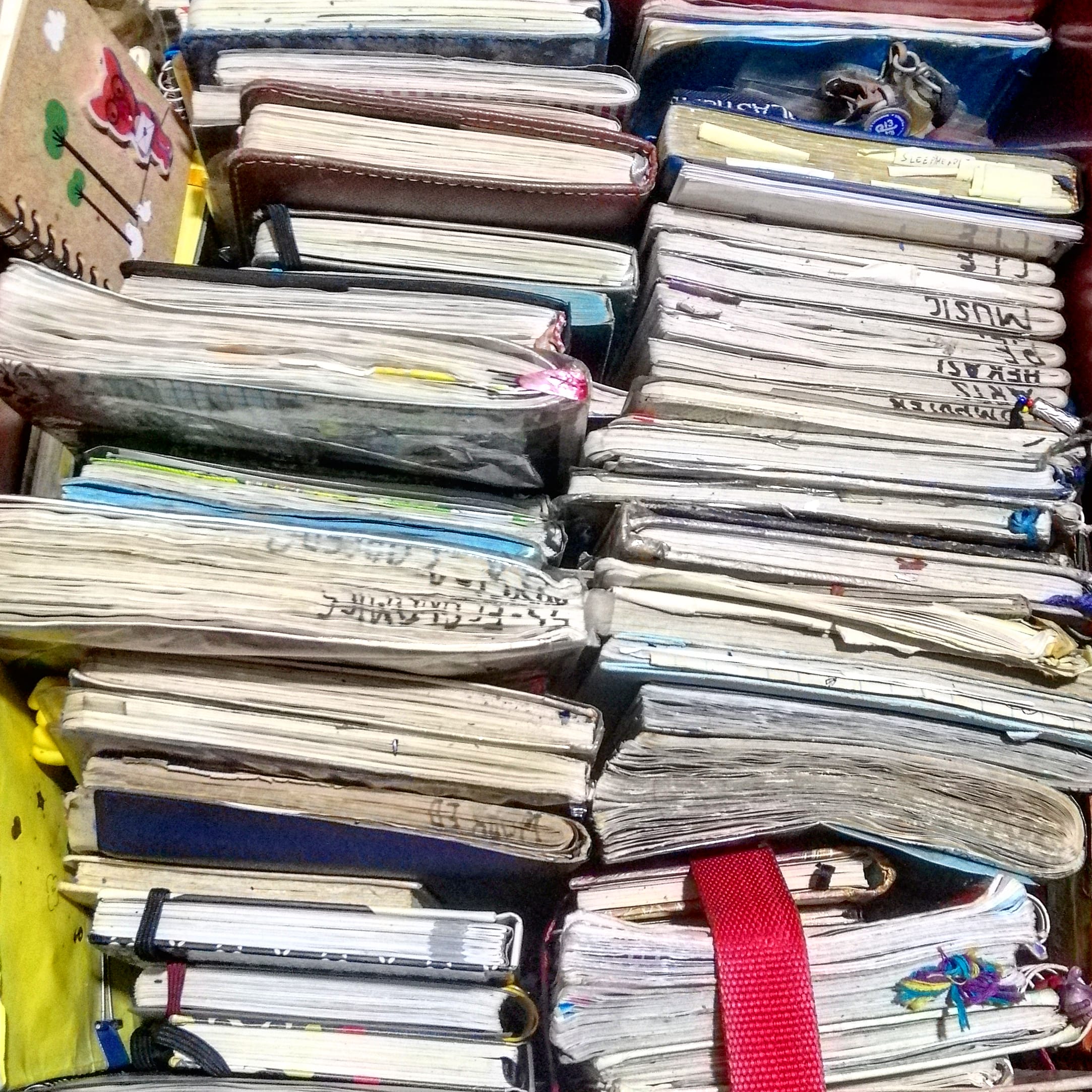 A ton of my used/finished notebooks from the late 2000s to early 2015