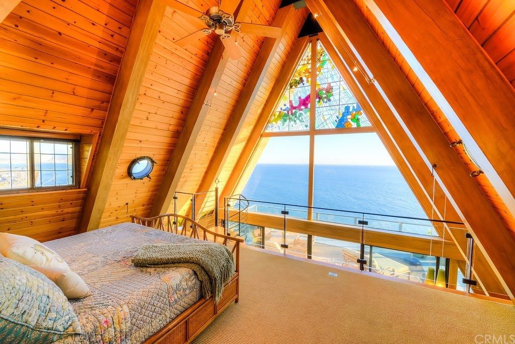 Loft Bedroom in Historic AFrame. One of only a few properties on a preserve in Dana Point