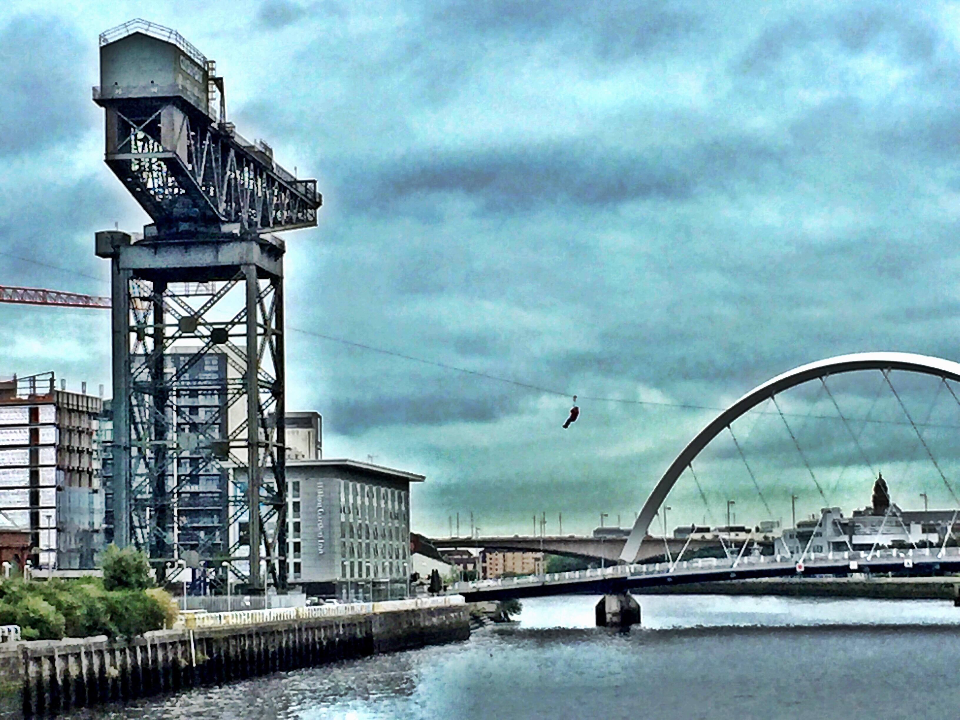 Someone zip lining over the river Clyde in Glasgow today. r