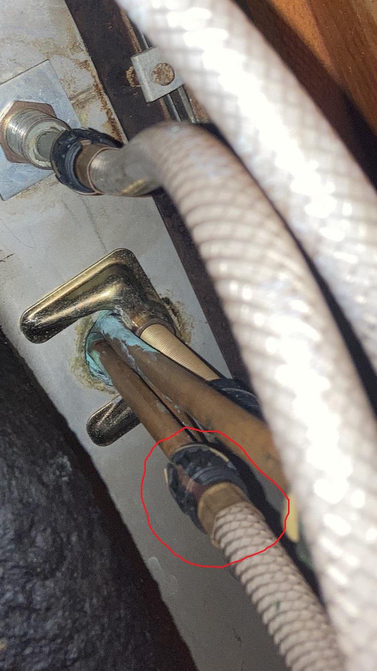 Trying to plug a kitchen sink sprayer. How do I remove this connection