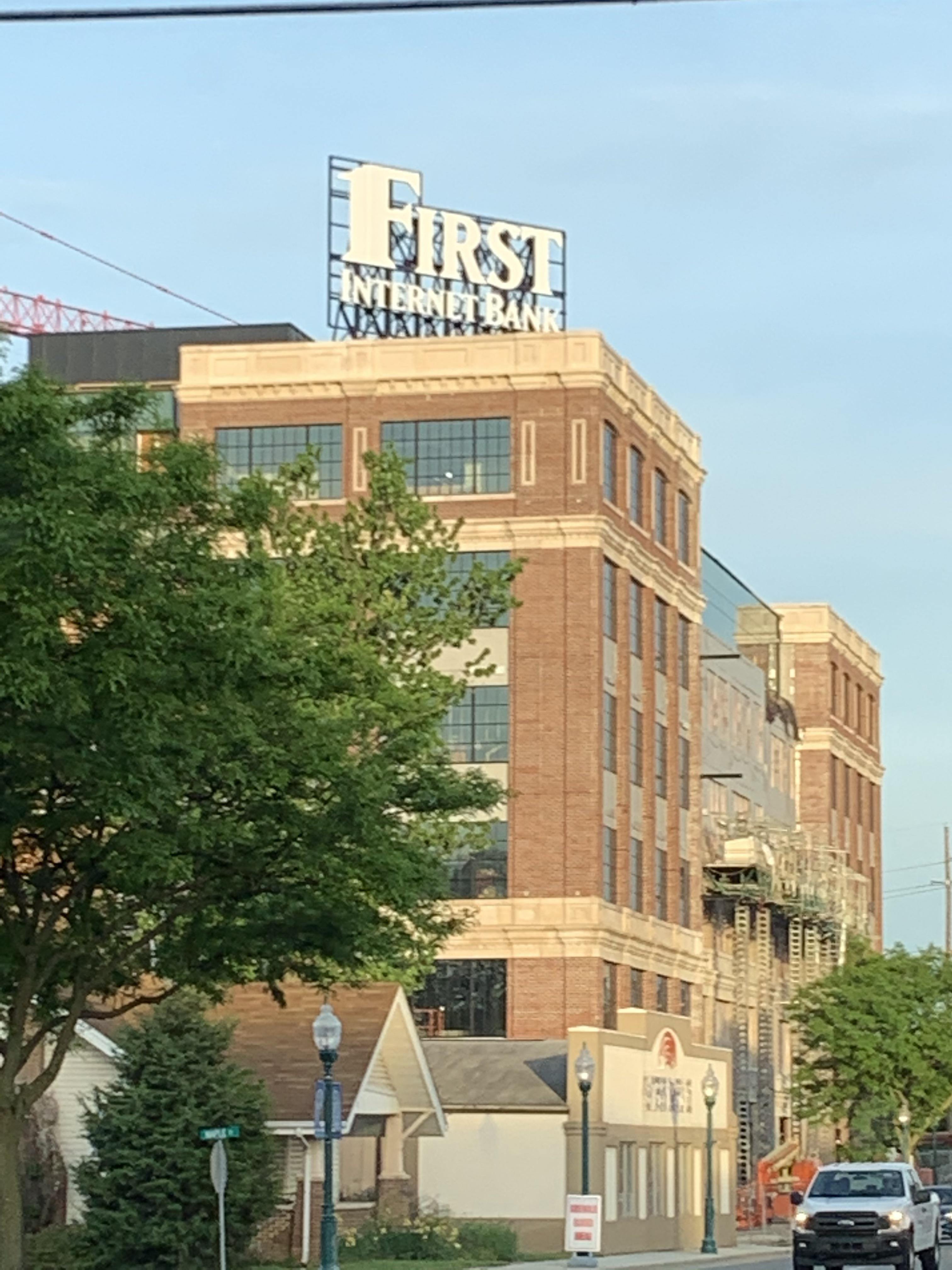 Sign atop a new building in downtown Fishers. Love the retro look but