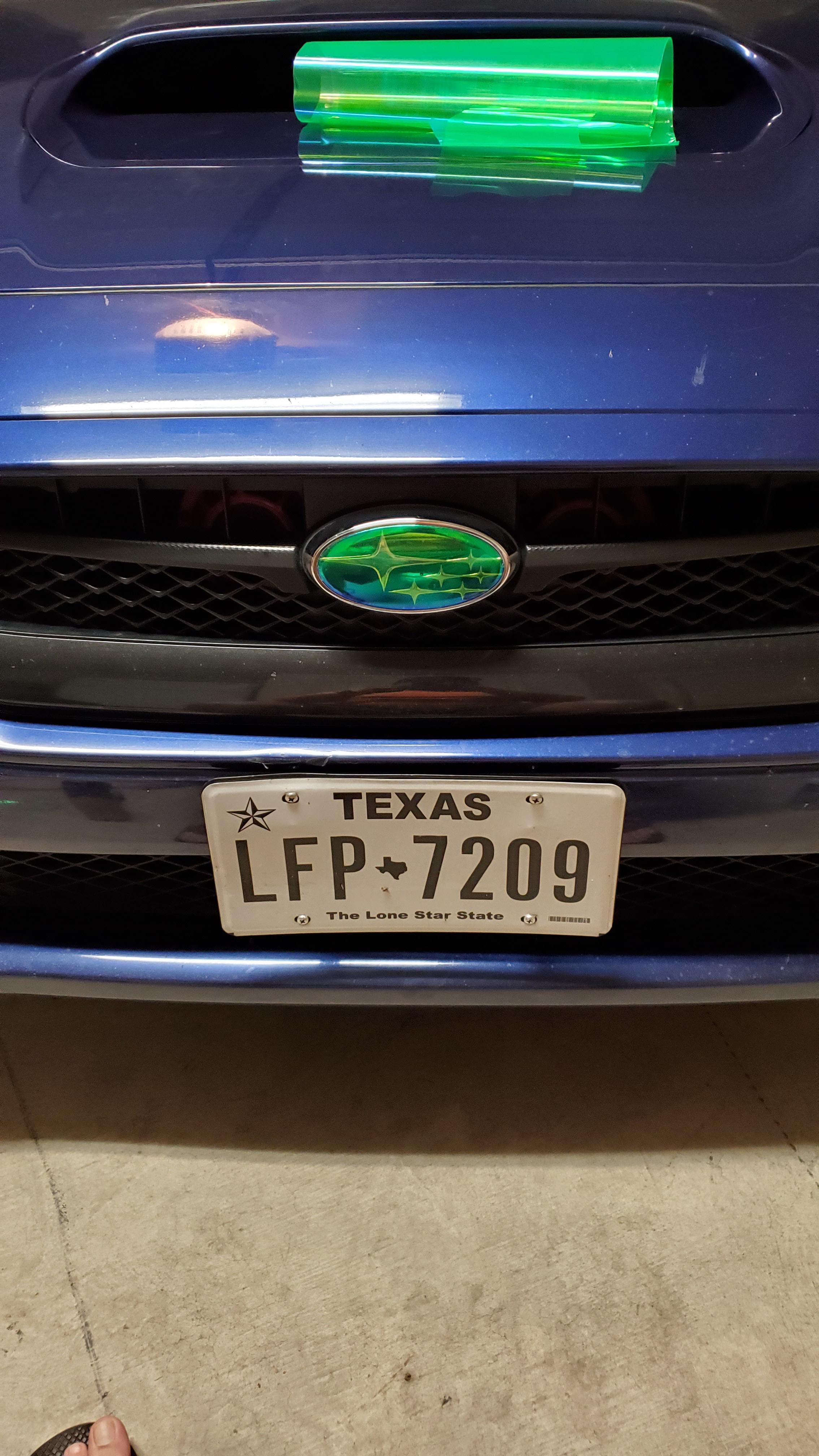 Tinted/wrapped emblems and fog lights the other day...not sure what to