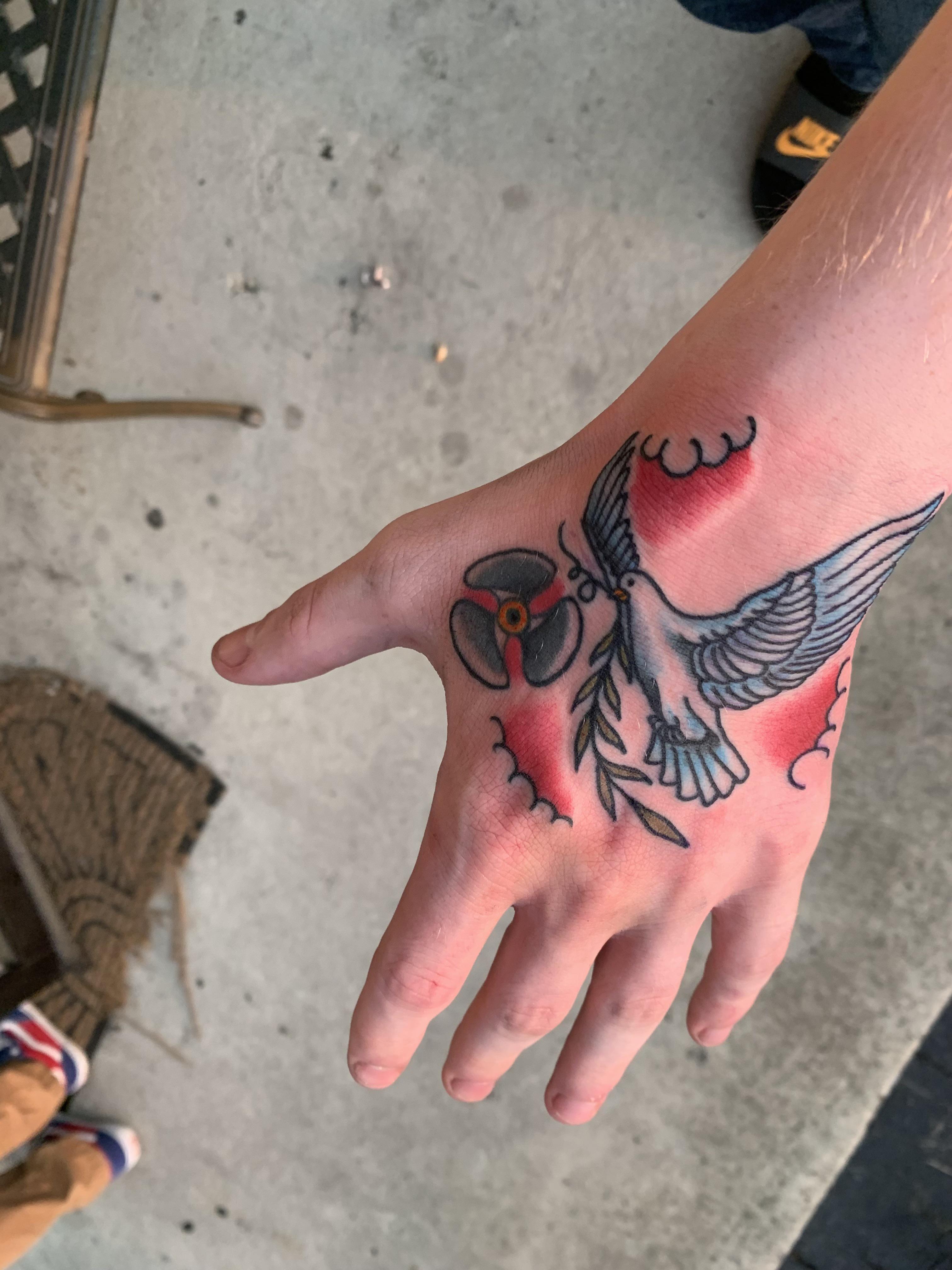 traditional dove done be Gunnar Henderson Artistic Ink in Summerville