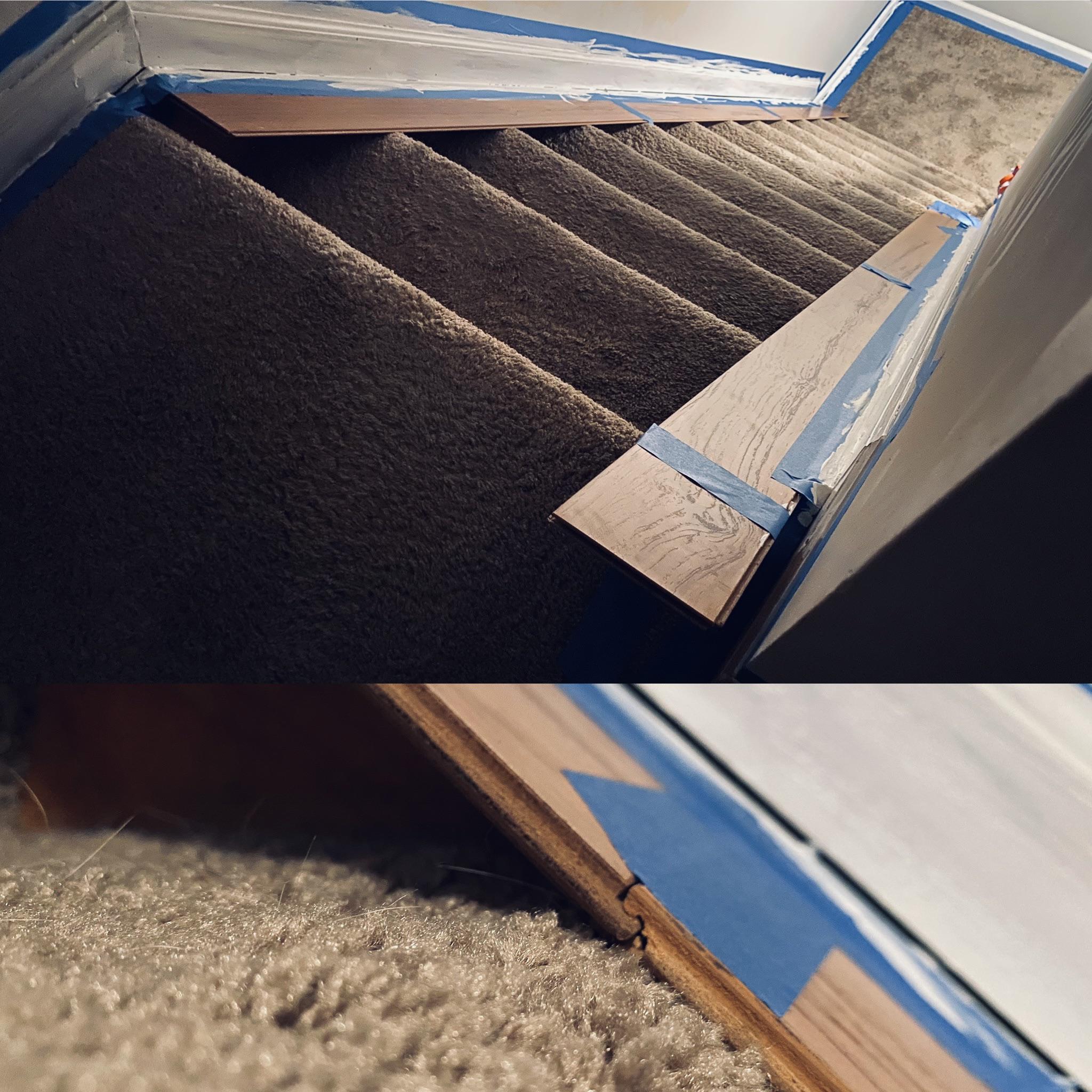 Surplus laminate flooring used to mask off carpet while painting