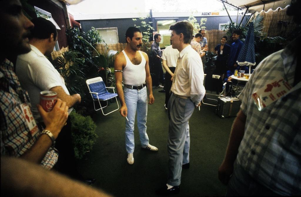 Queen singer Freddie Mercury and David Bowie talking backstage at the