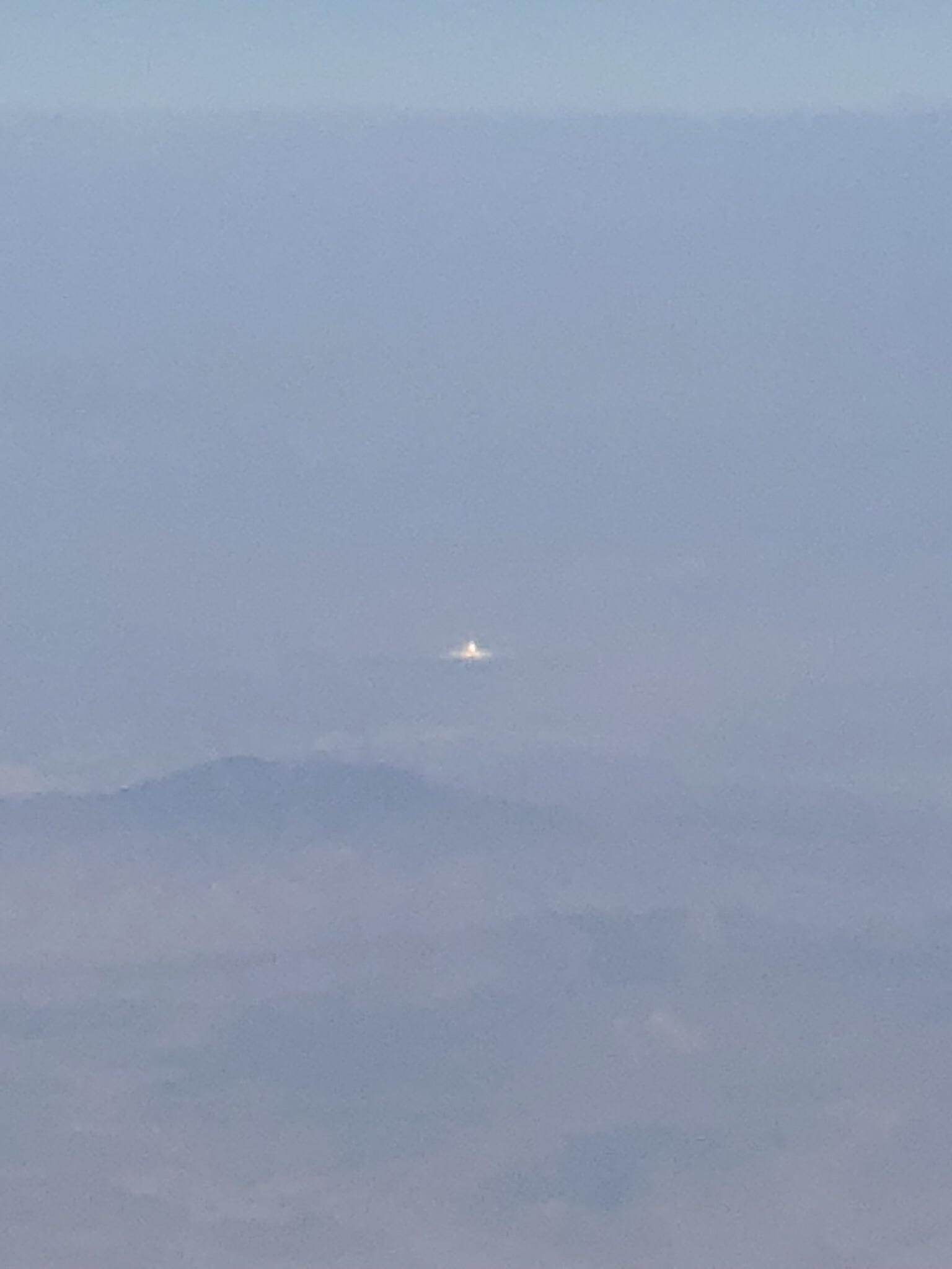 Strange light on ground seen from air over southern Nevada/California