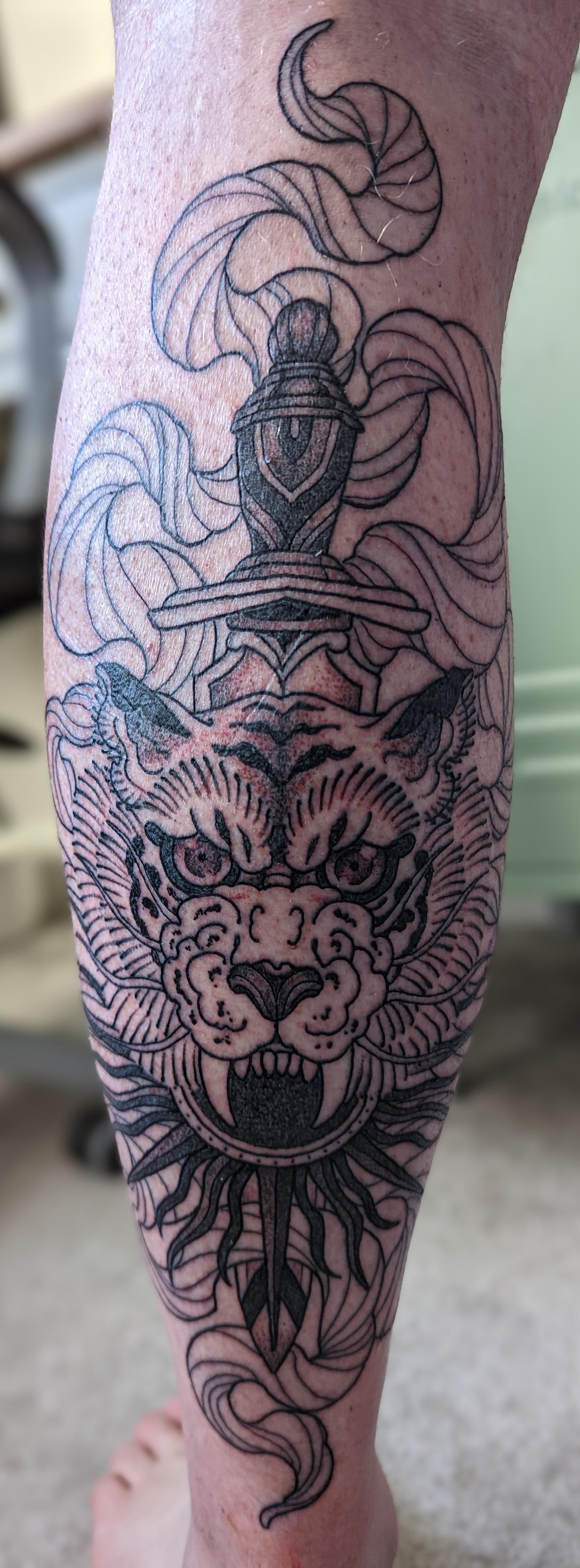 Dagger, tiger & sun tattoo (Session 1) by Maria Amat at Sacred Gold