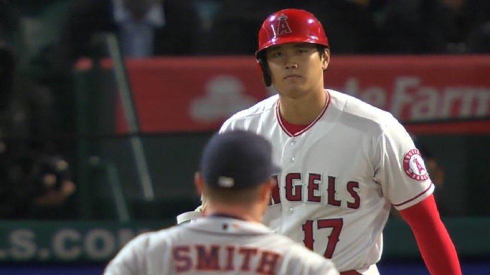 Ohtani stares down the pitcher after getting hit by a pitch baseball
