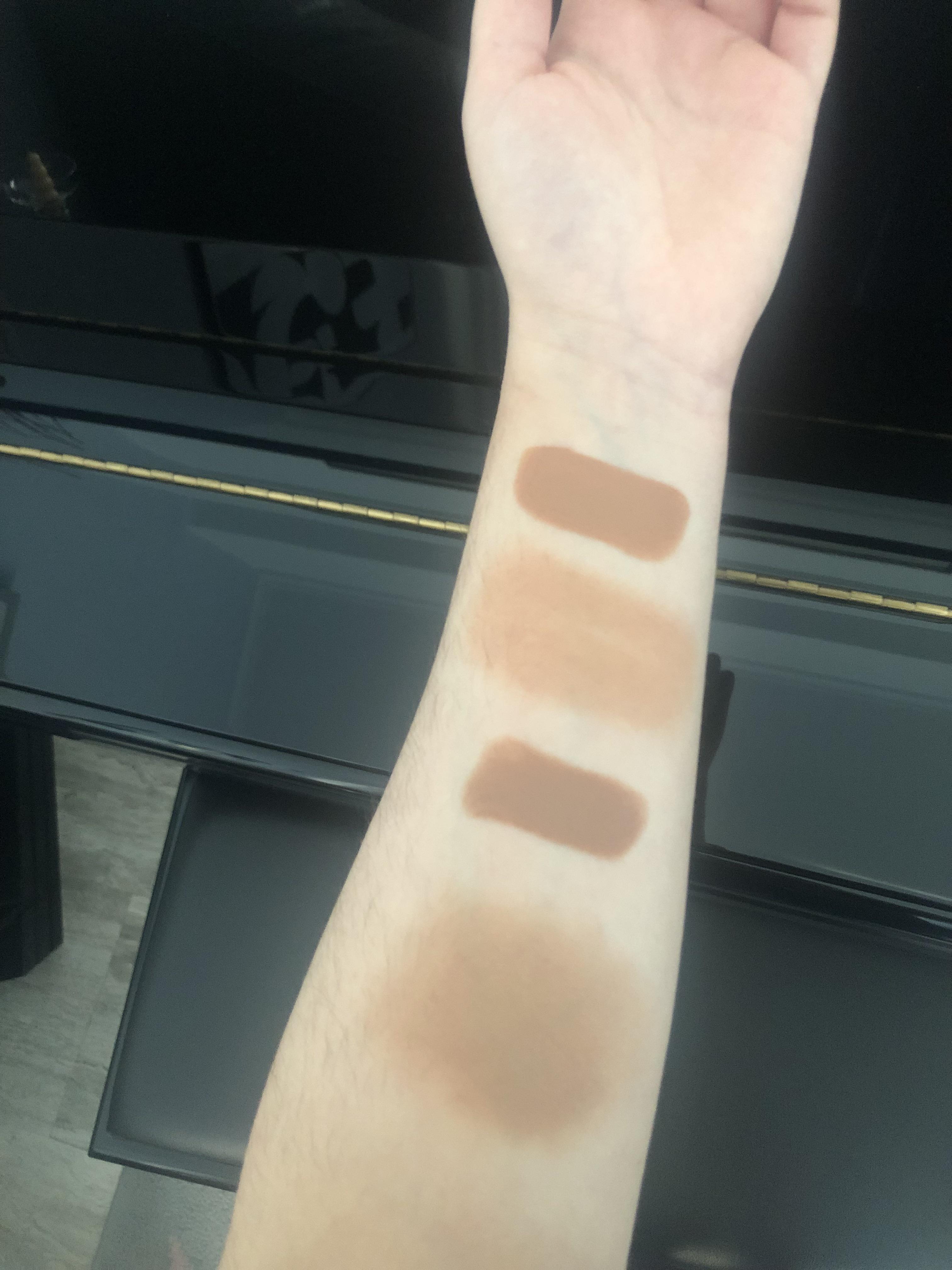 Rare Beauty Happy Sol bronzer stick and Benefit Hoola in stick form