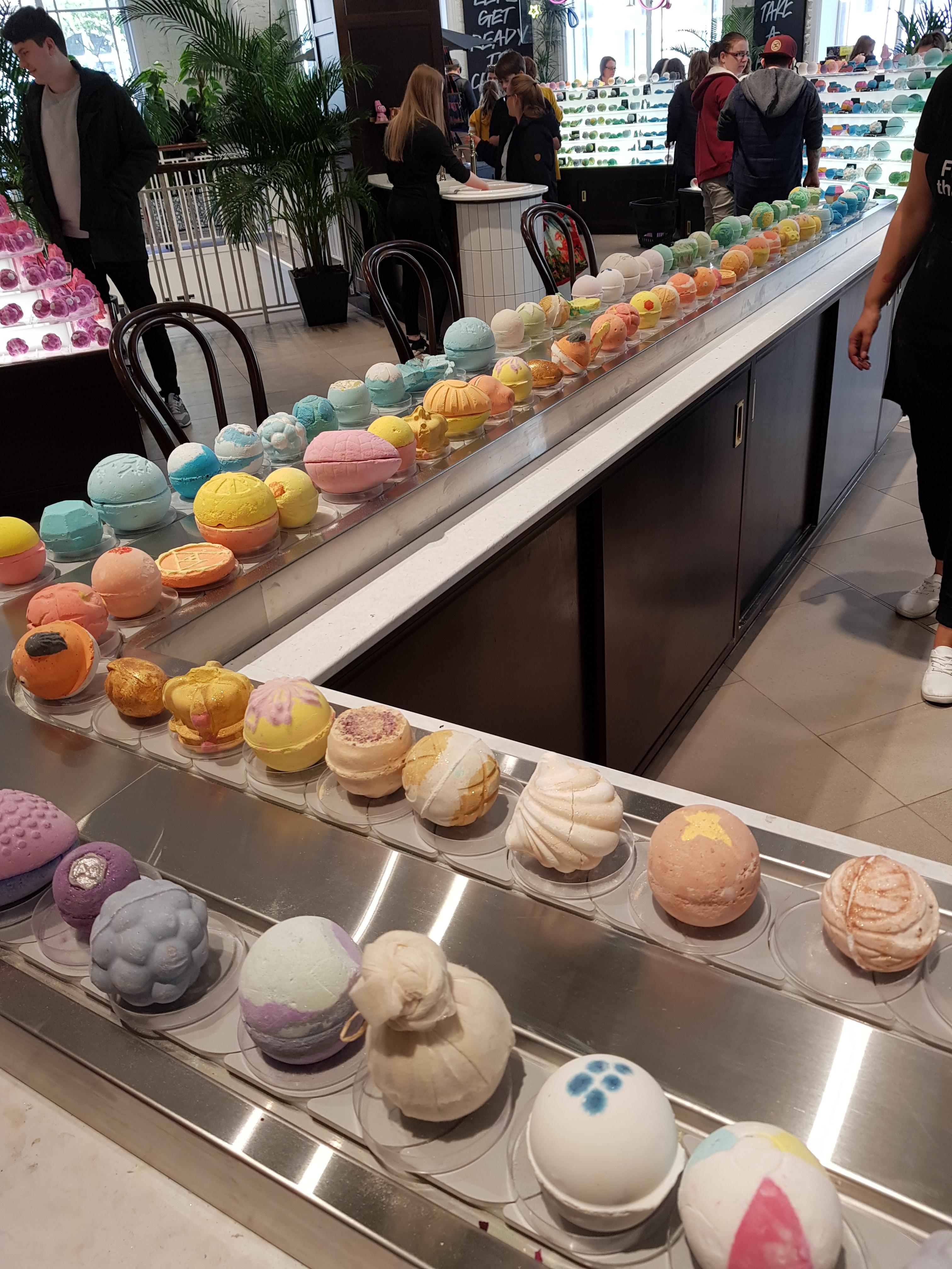 This Lush has 3 floors and a conveyor belt of bath bombs.. r