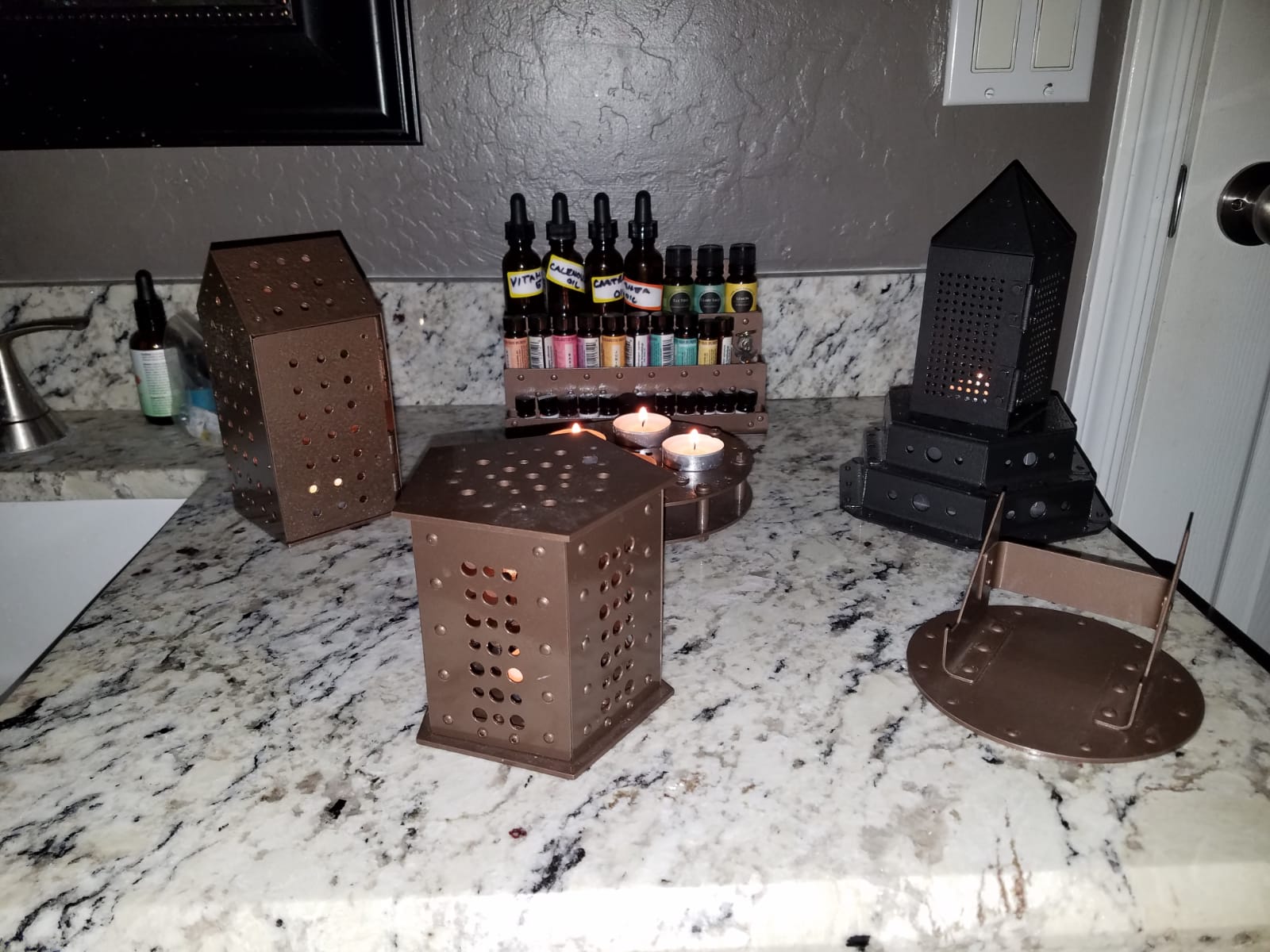 More knick knacks I made for the wife's bathroom from T3 aluminum. 3 different style lanterns, a