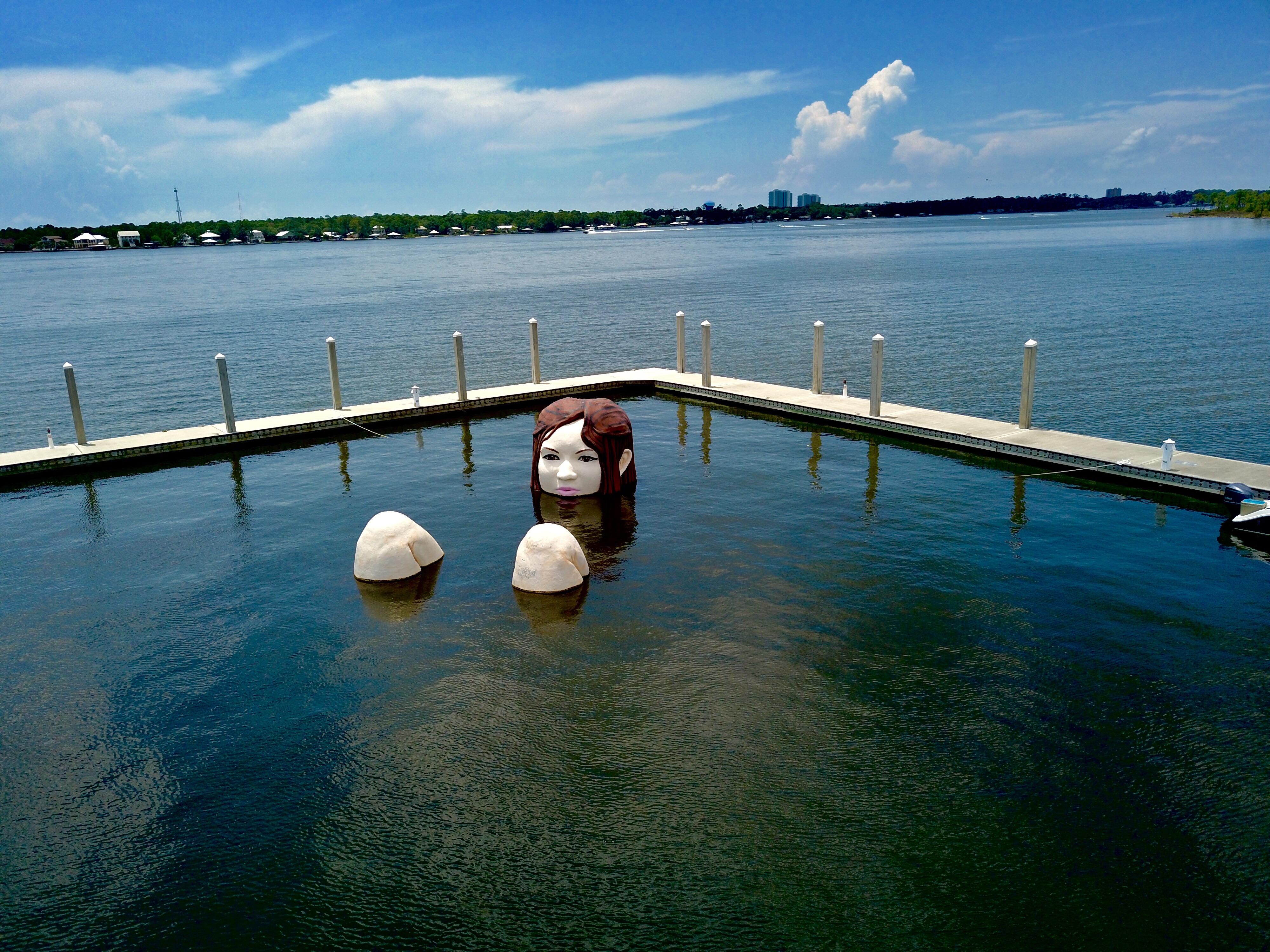 Lady in the water. Elberta, AL. Alabama is weird. Shot on Mavic pro. r/djimavic