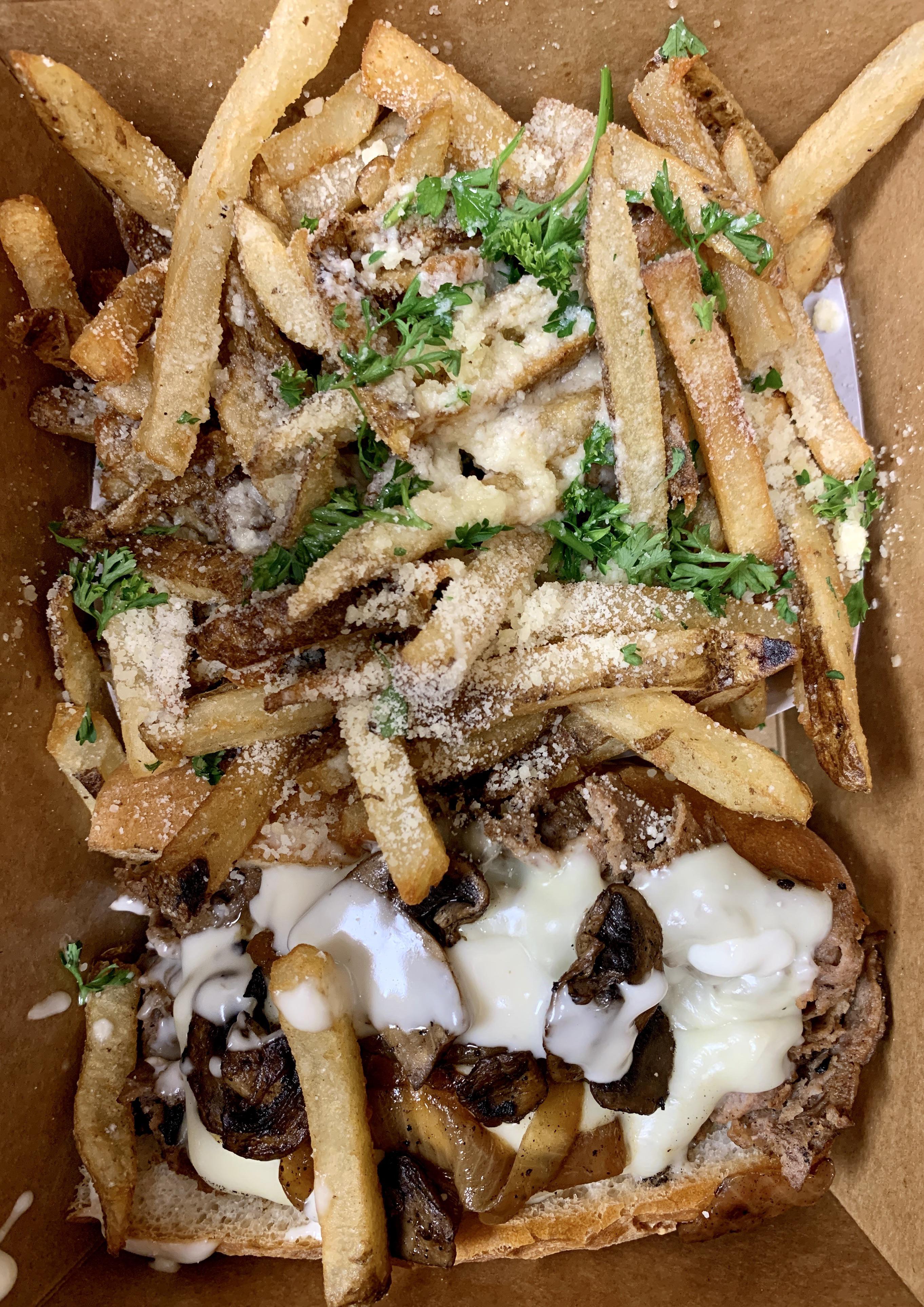 Red’s Street Food Truck. The OG steak with Parm fries. Love this truck