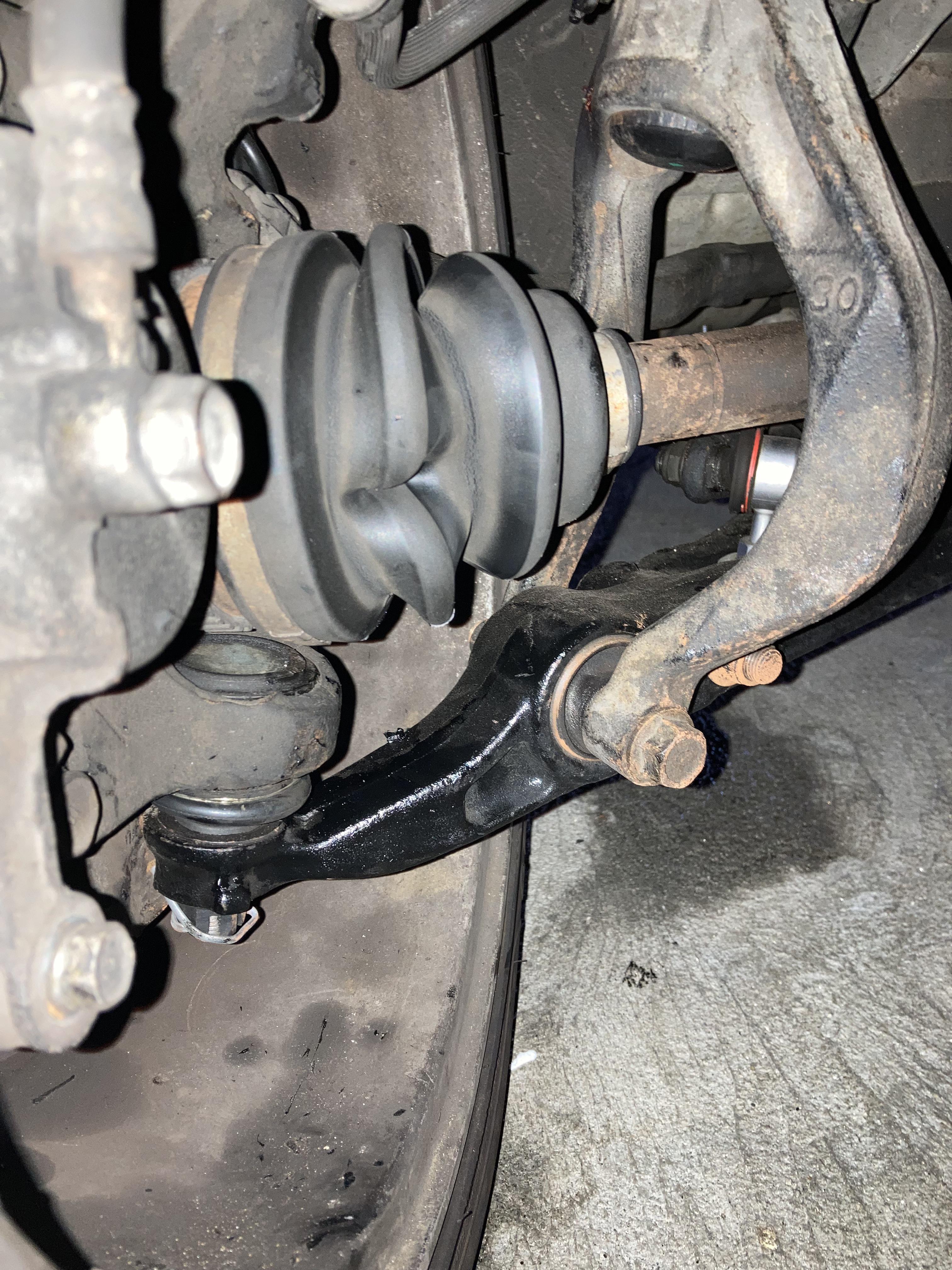 Is this new ball joint leaking? 1700 miles since replaced. MechanicAdvice