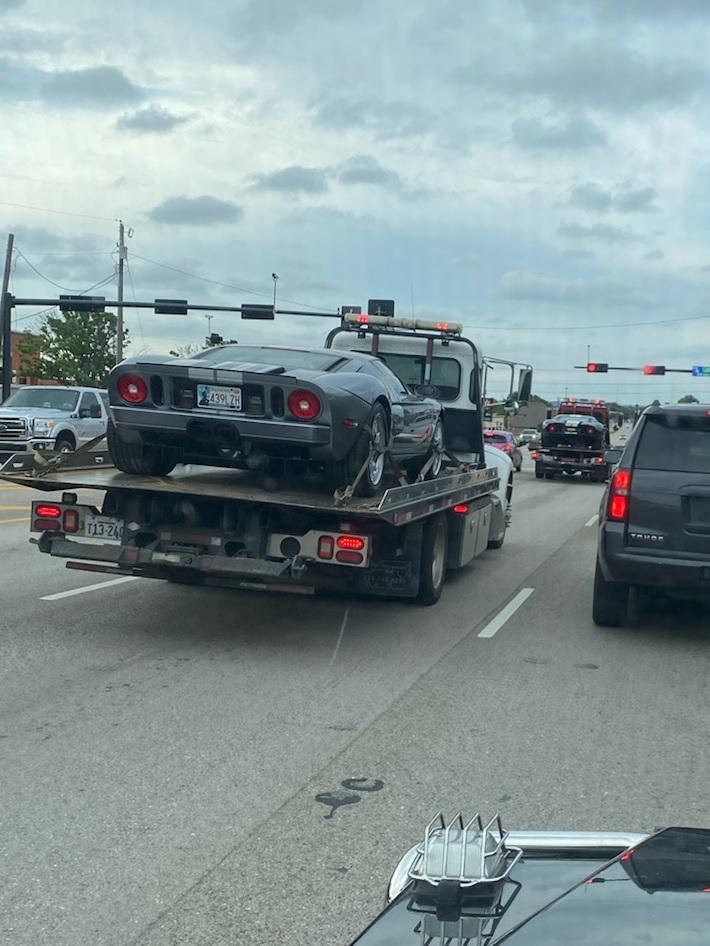 Saw a [Ford GT] being trailered next to me at a stoplight, then