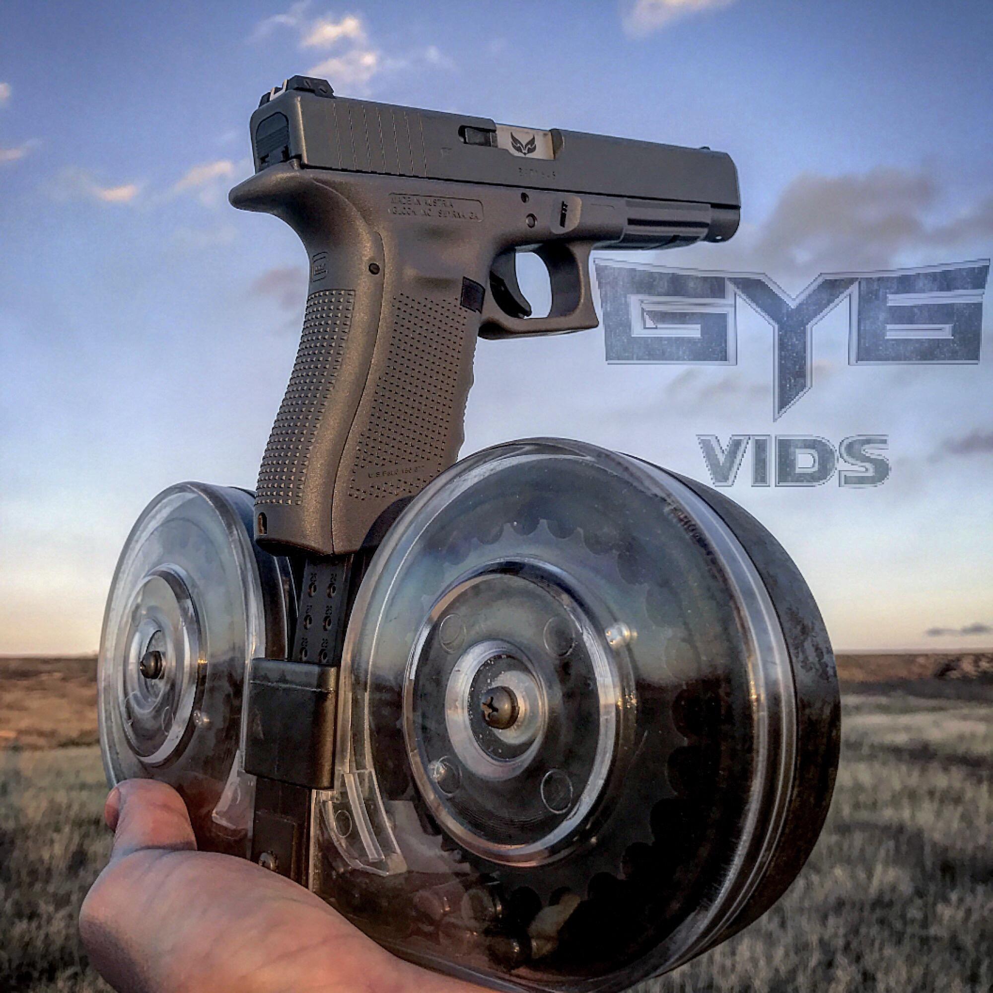 Glock 34 with 100rd Drum [OC] [2000x2000] r/GunPorn