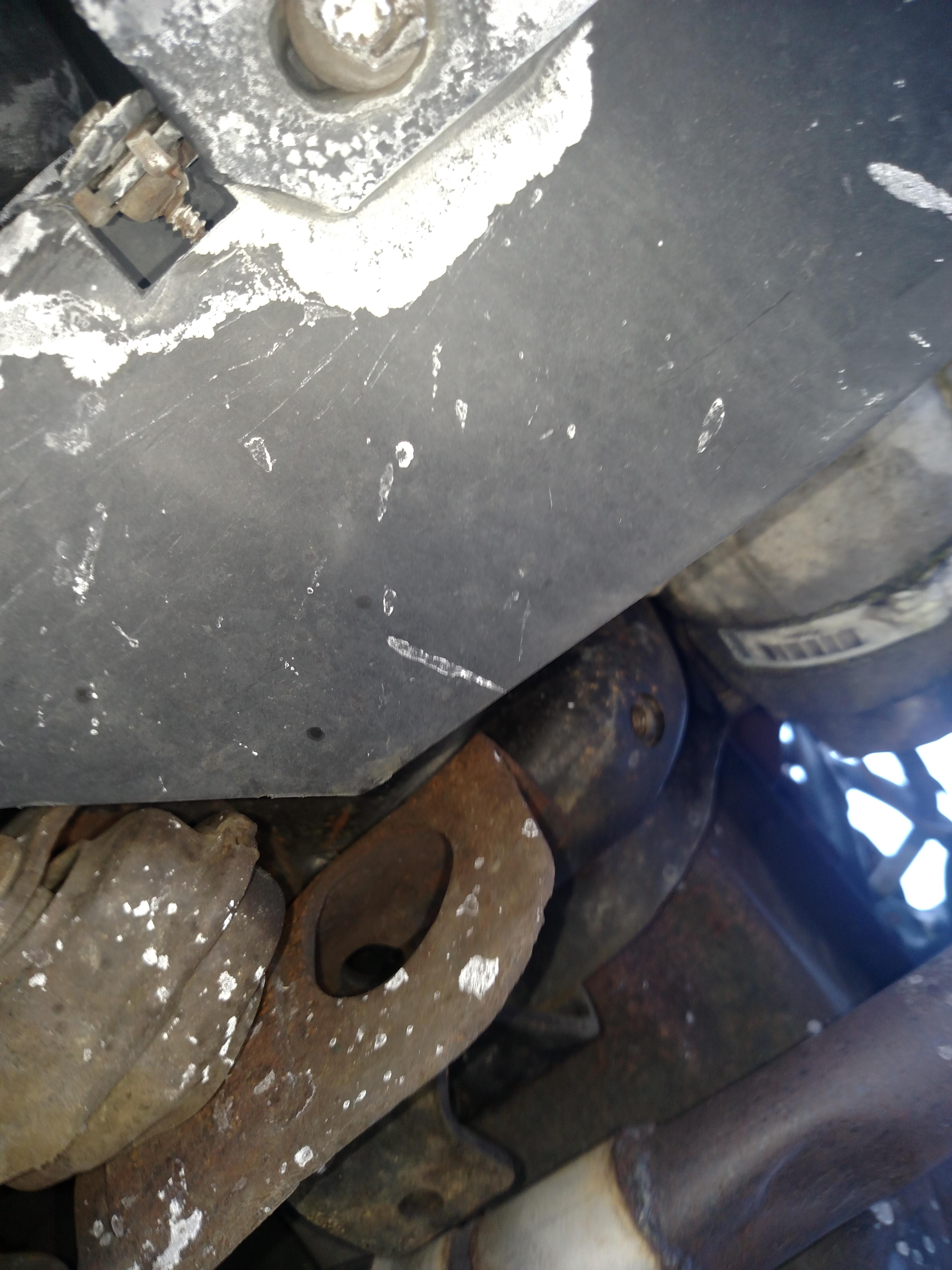 See that dent on the exhaust pipe just before it connects down to the