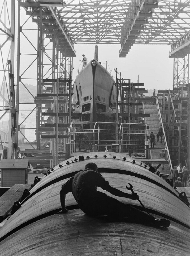 Ship fitter at Electric Boat in Groton, CT working on a submarine. WW2
