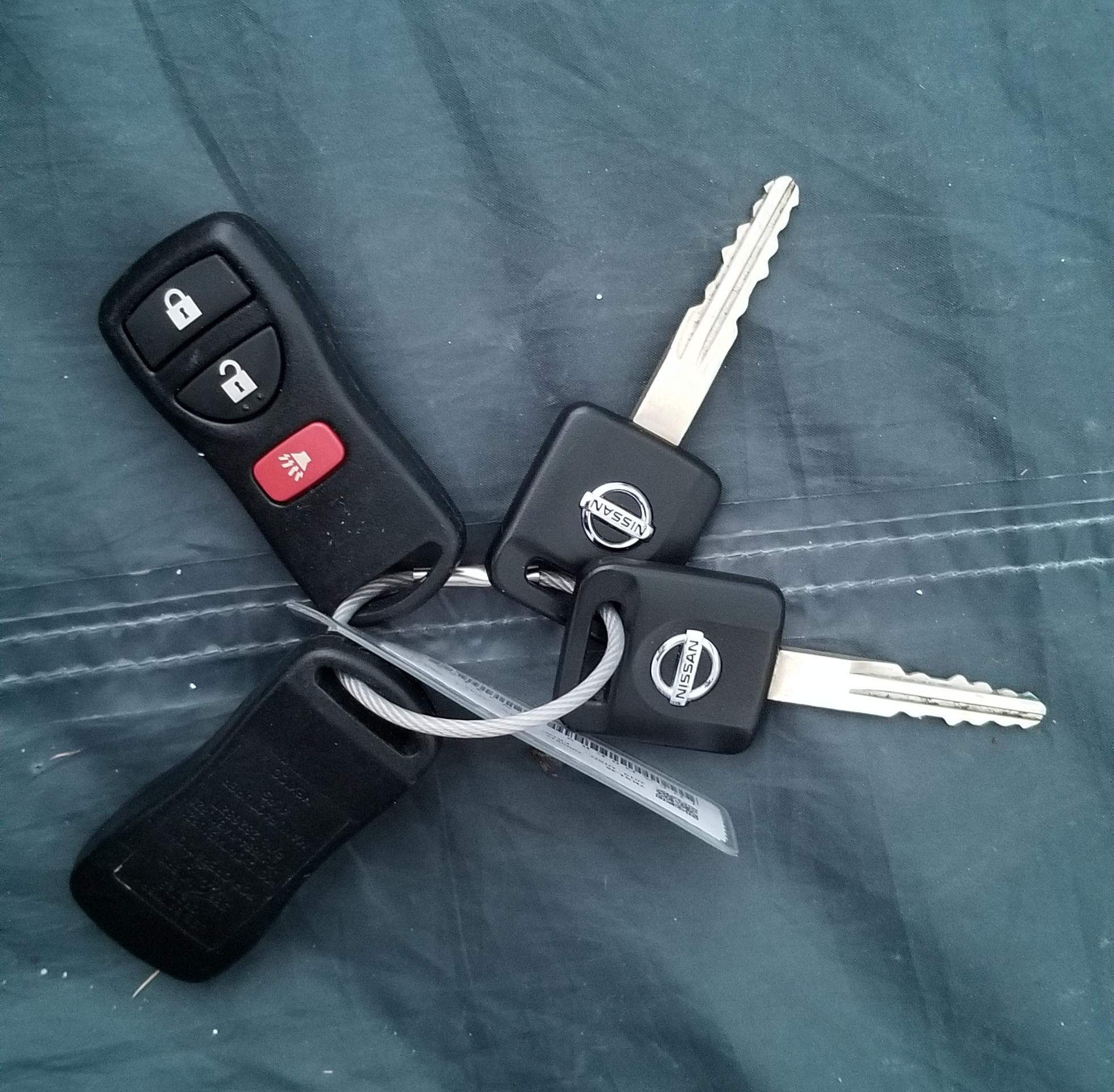 Rental car comes with two *nonseparable* sets of keys/fobs. Just in
