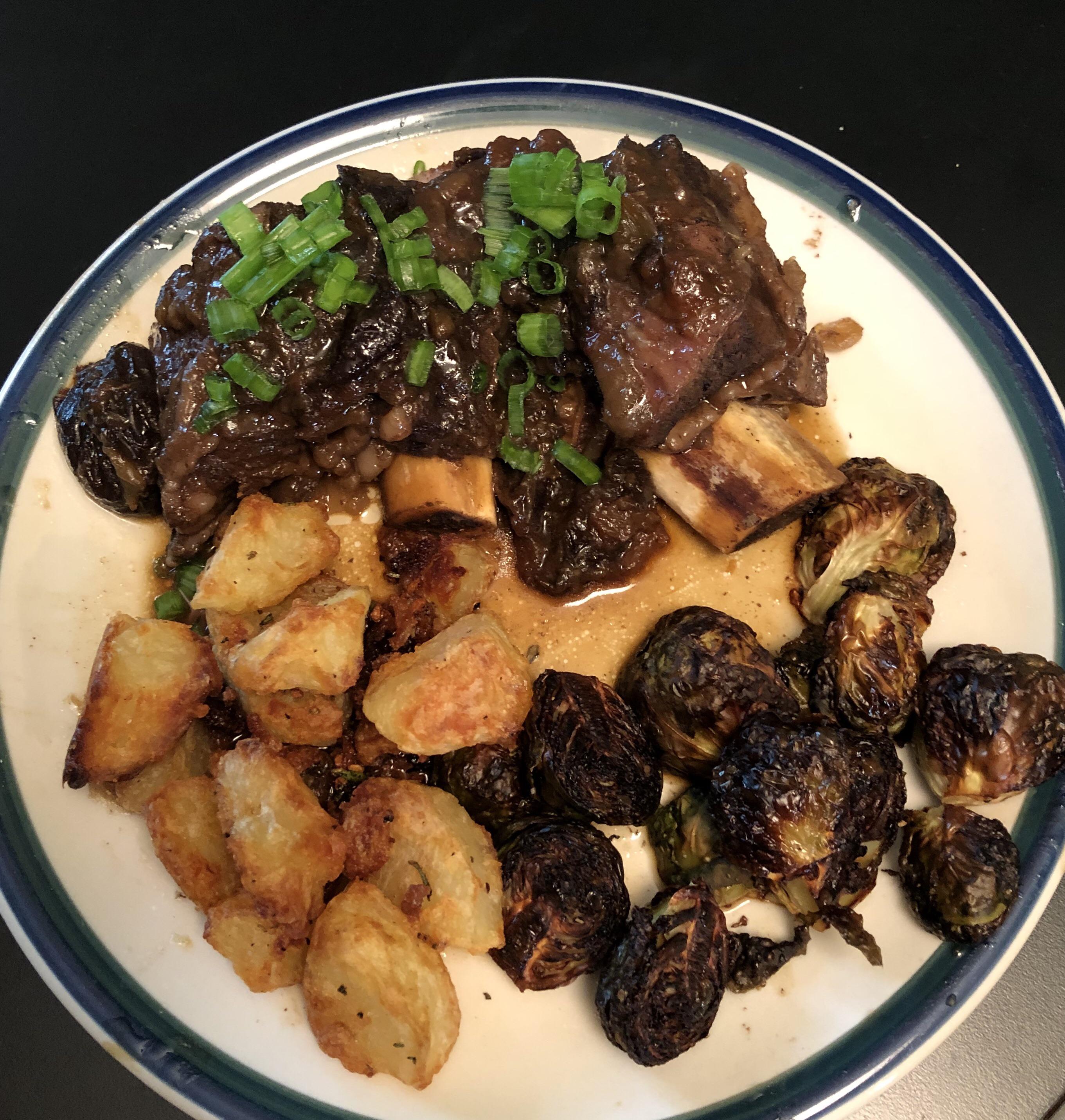 Instant pot short ribs with plum sauce! Served with oven roasted