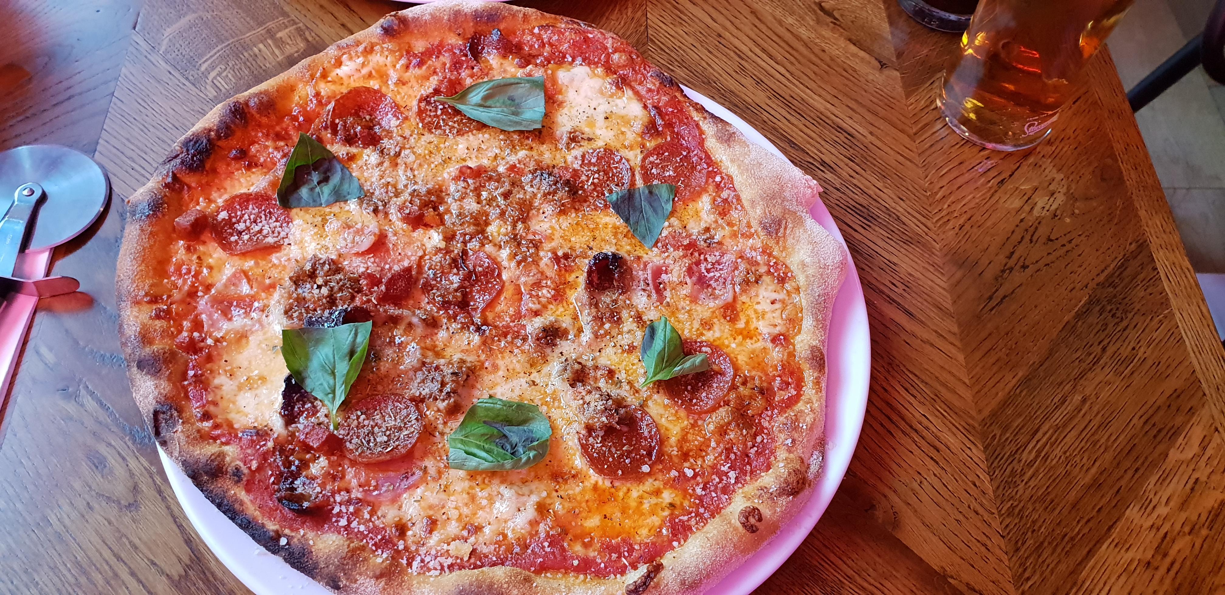 I just ate this pepperoni, Tuscan sausage, ham and candied bacon pizza