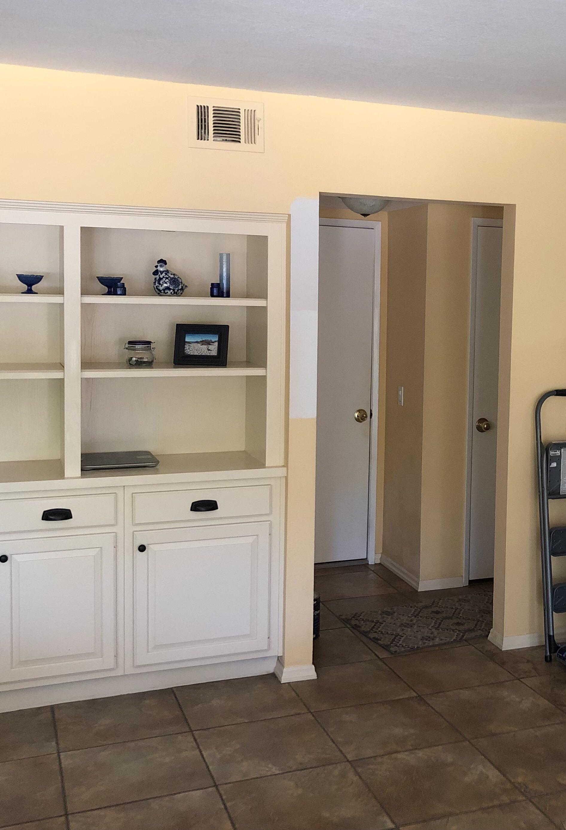 What color should I paint the walls to match antique white trim? Having