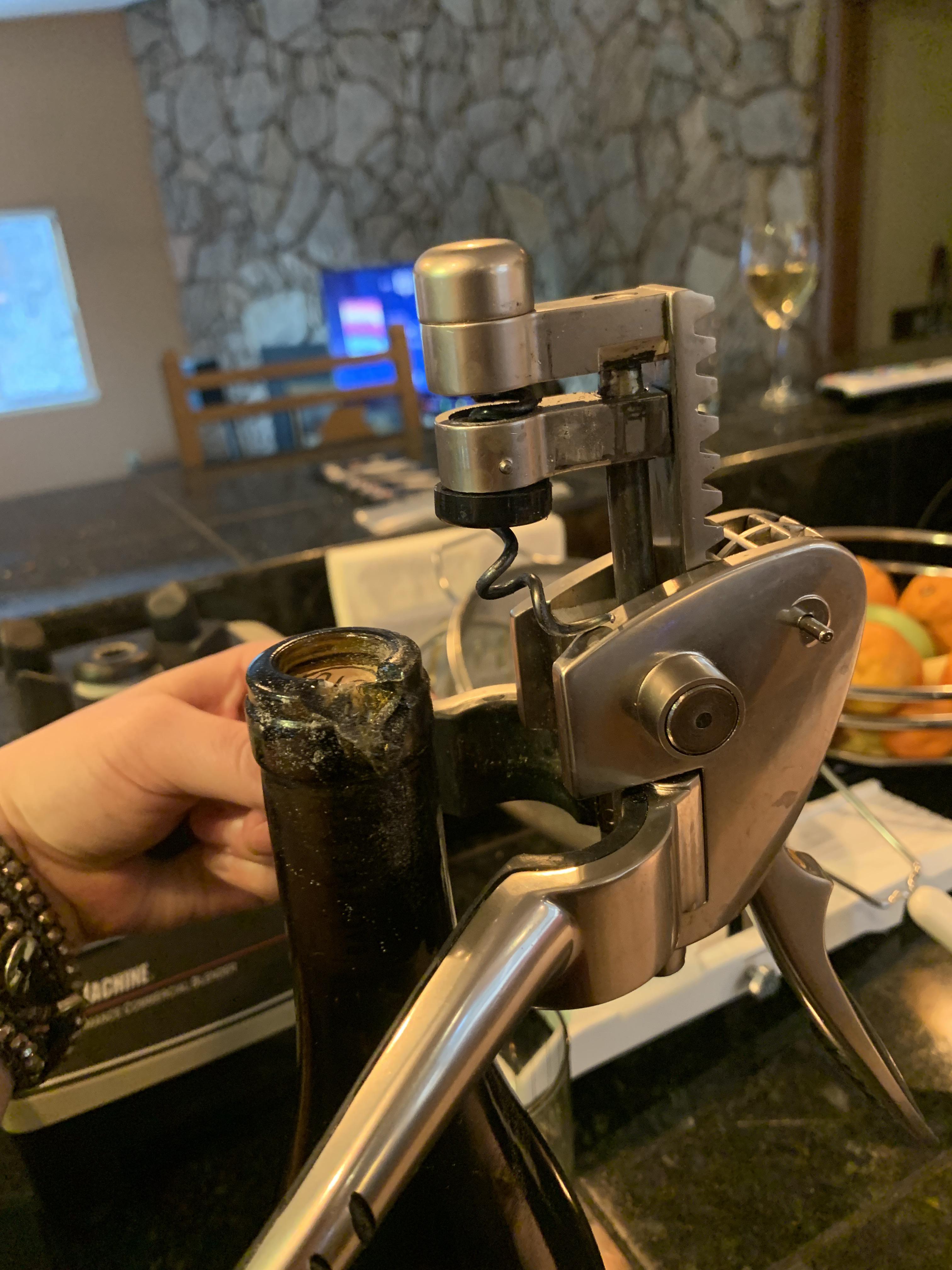 Broke the wine bottle opener and the wine bottle. Cork is stuck. Looks