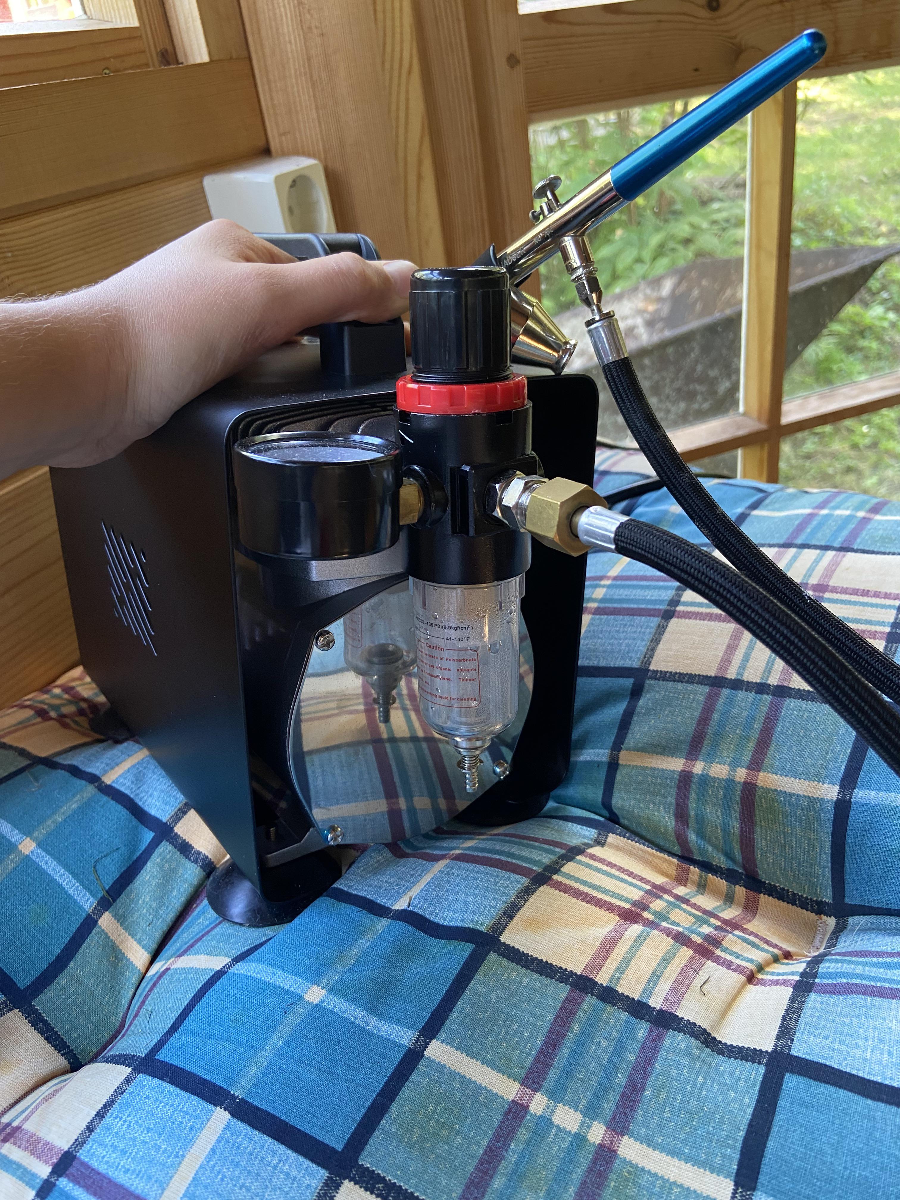 Why does my airbrush spray water when I paint? It has a water trap on