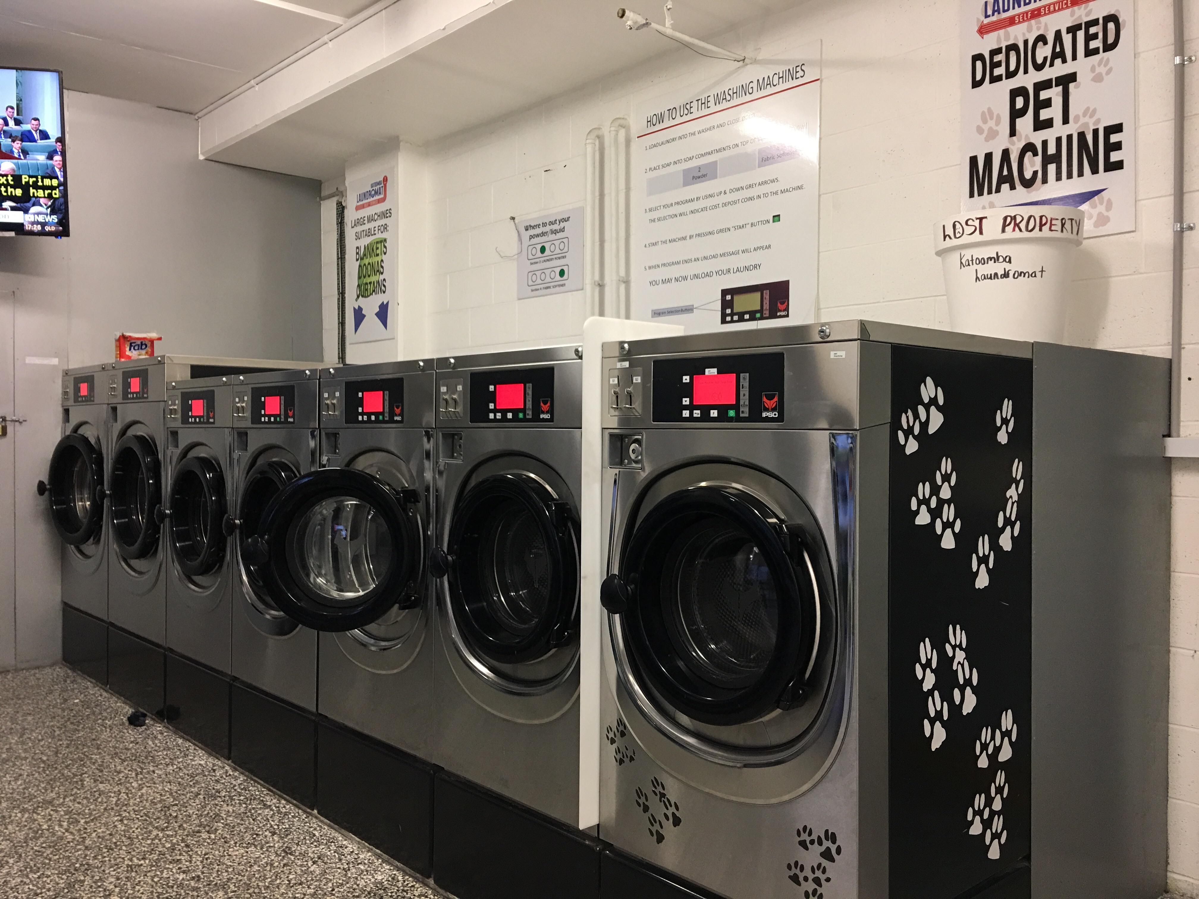 Public laundromat has a dedicated washing machine for pet gear r