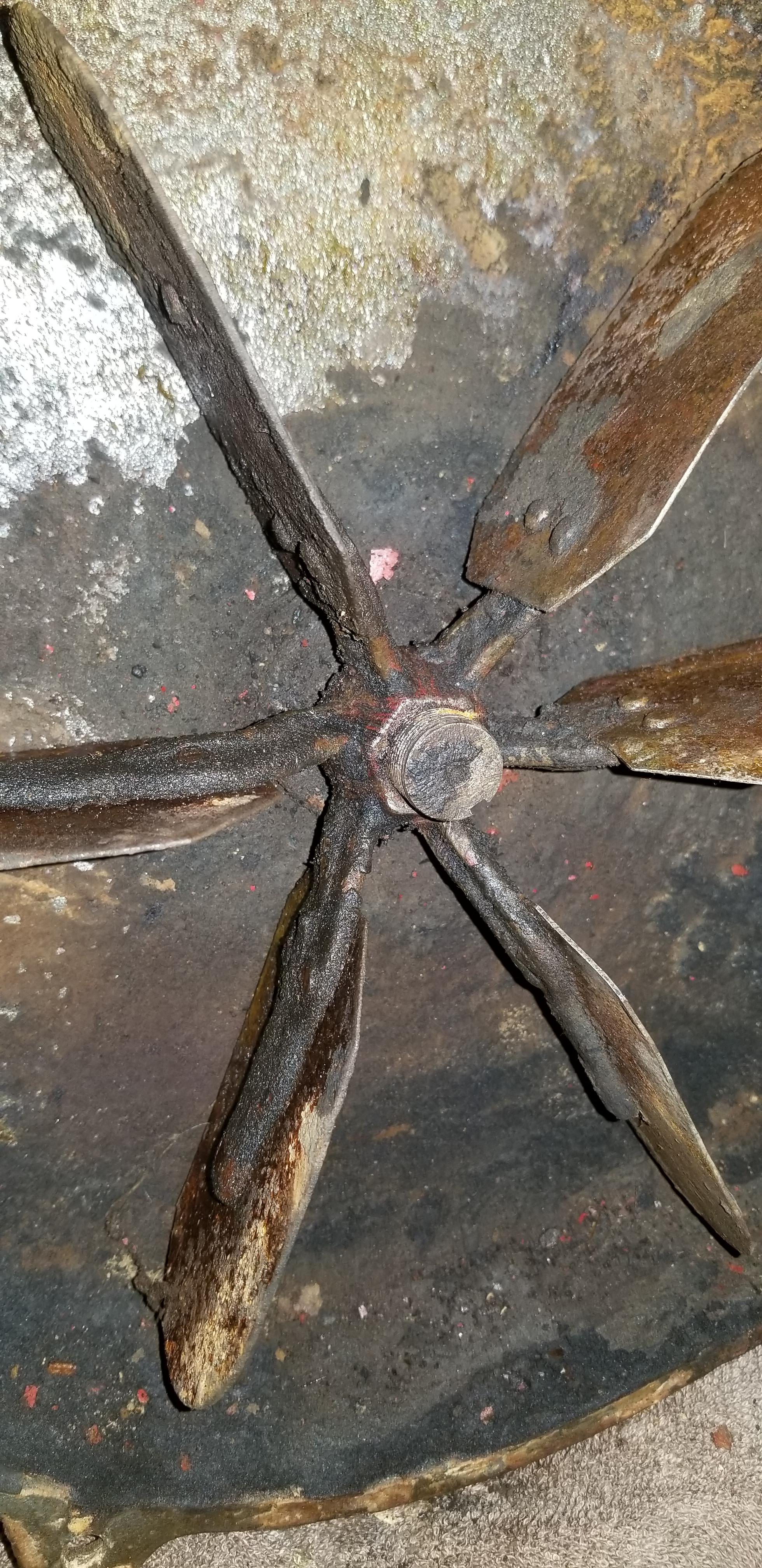 What's the trick to getting the fan blade off of a champion blower? r
