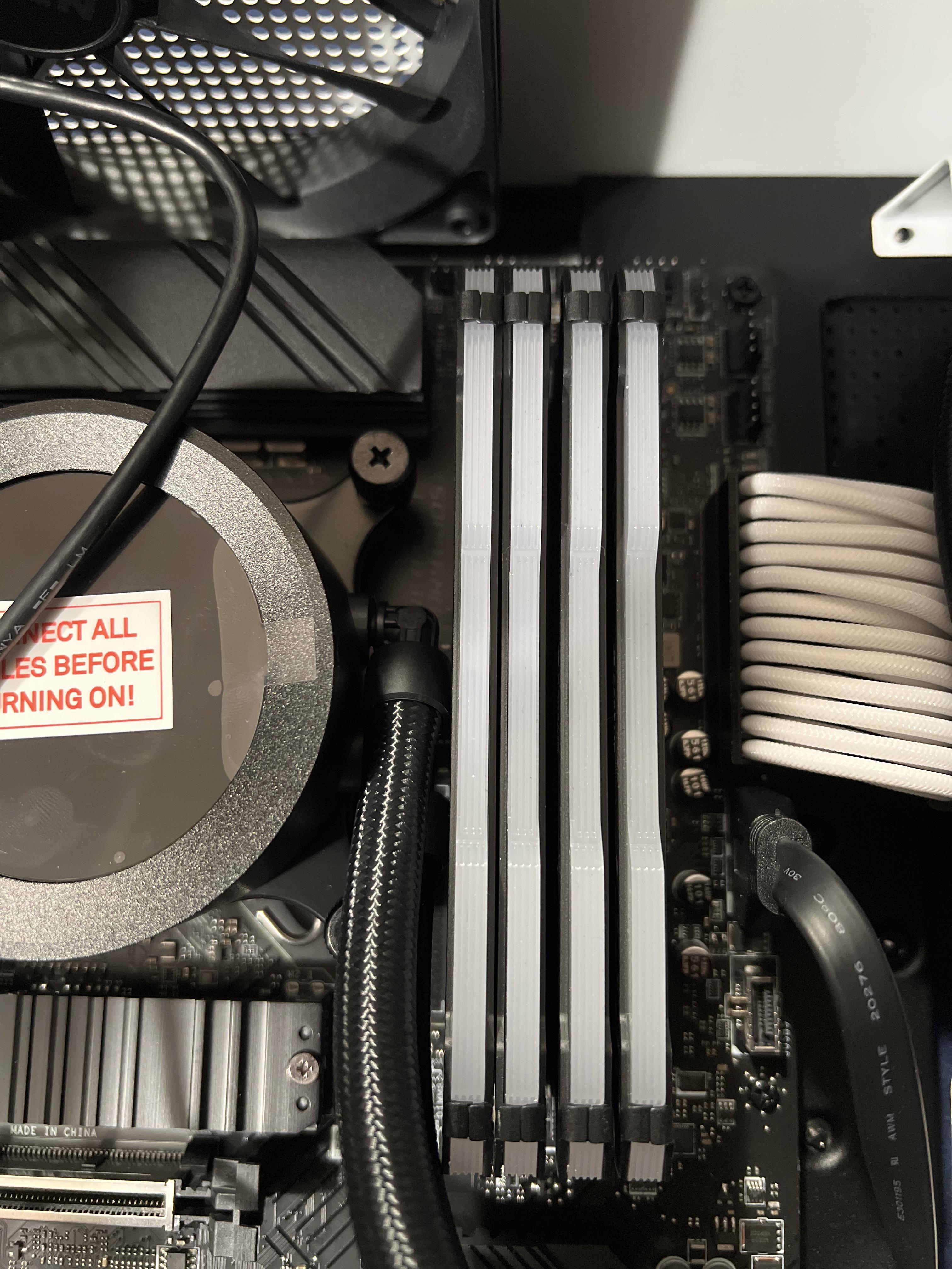 Water cooler is pushing the ram together a bit, is this okay or should